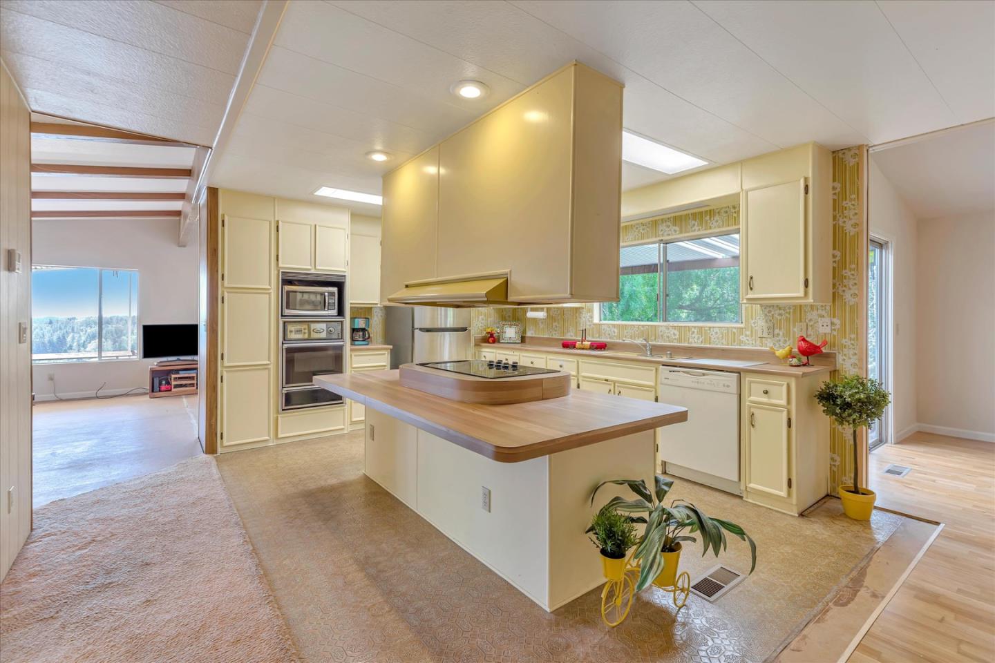 270 Hames Road, Unit 50 Corralitos, CA 95076 - Photo 12 of 31 a kitchen with a sink appliances and cabinets