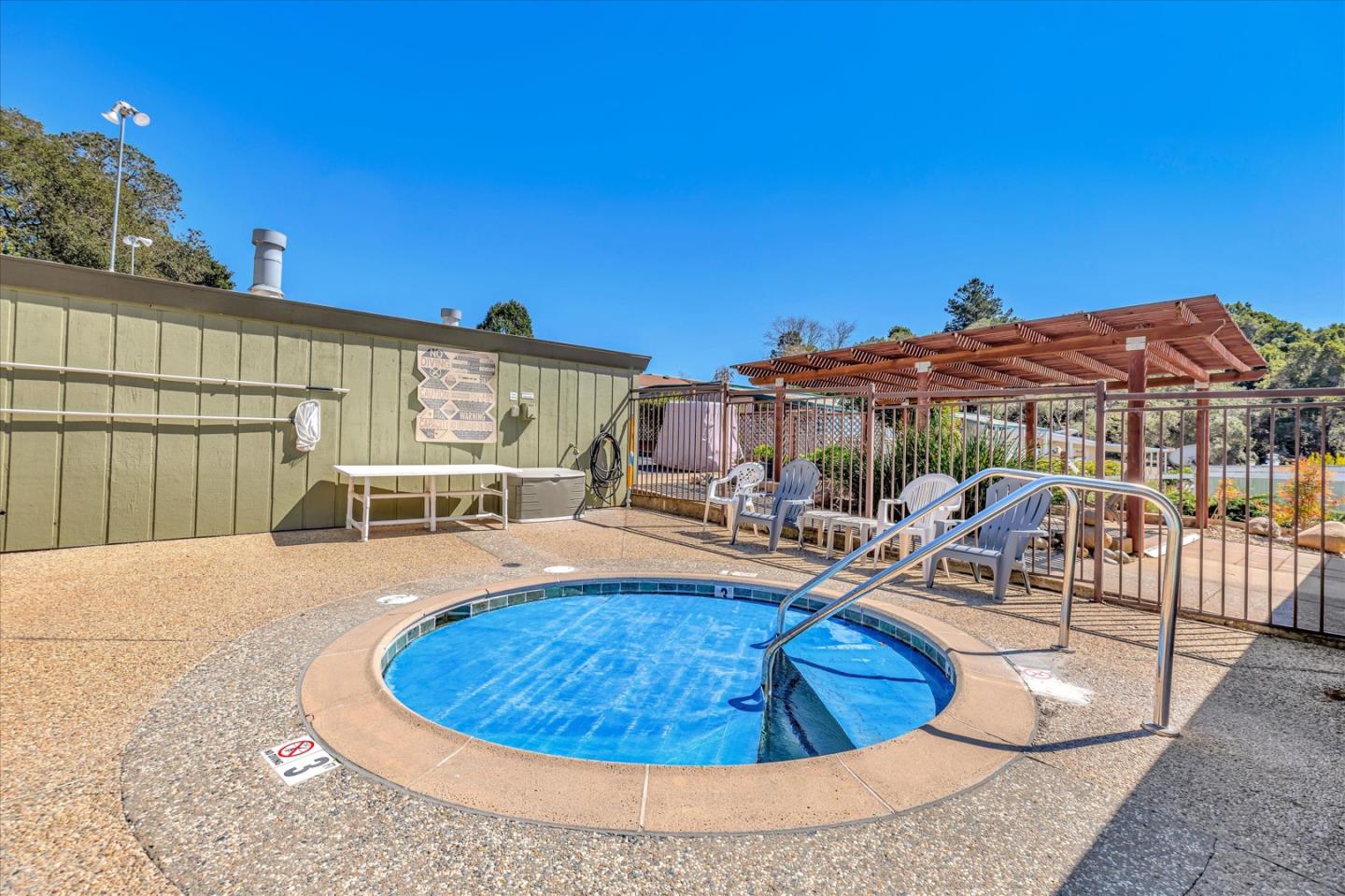 270 Hames Road, Unit 50 Corralitos, CA 95076 - Photo 23 of 31 a view of a swimming pool with an outdoor seating