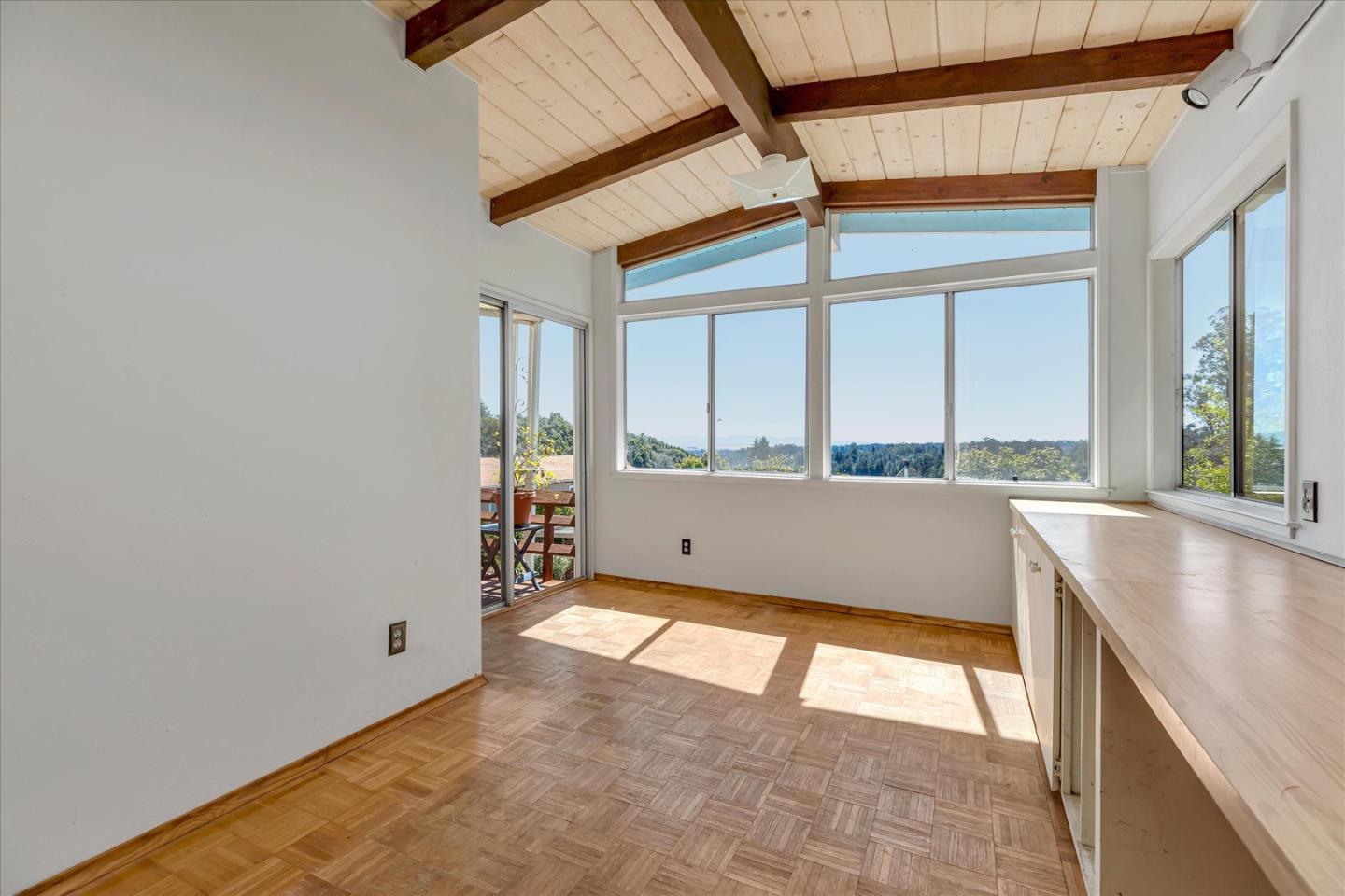 270 Hames Road, Unit 50 Corralitos, CA 95076 - Photo 8 of 31 a view of a kitchen with kitchen island a large window