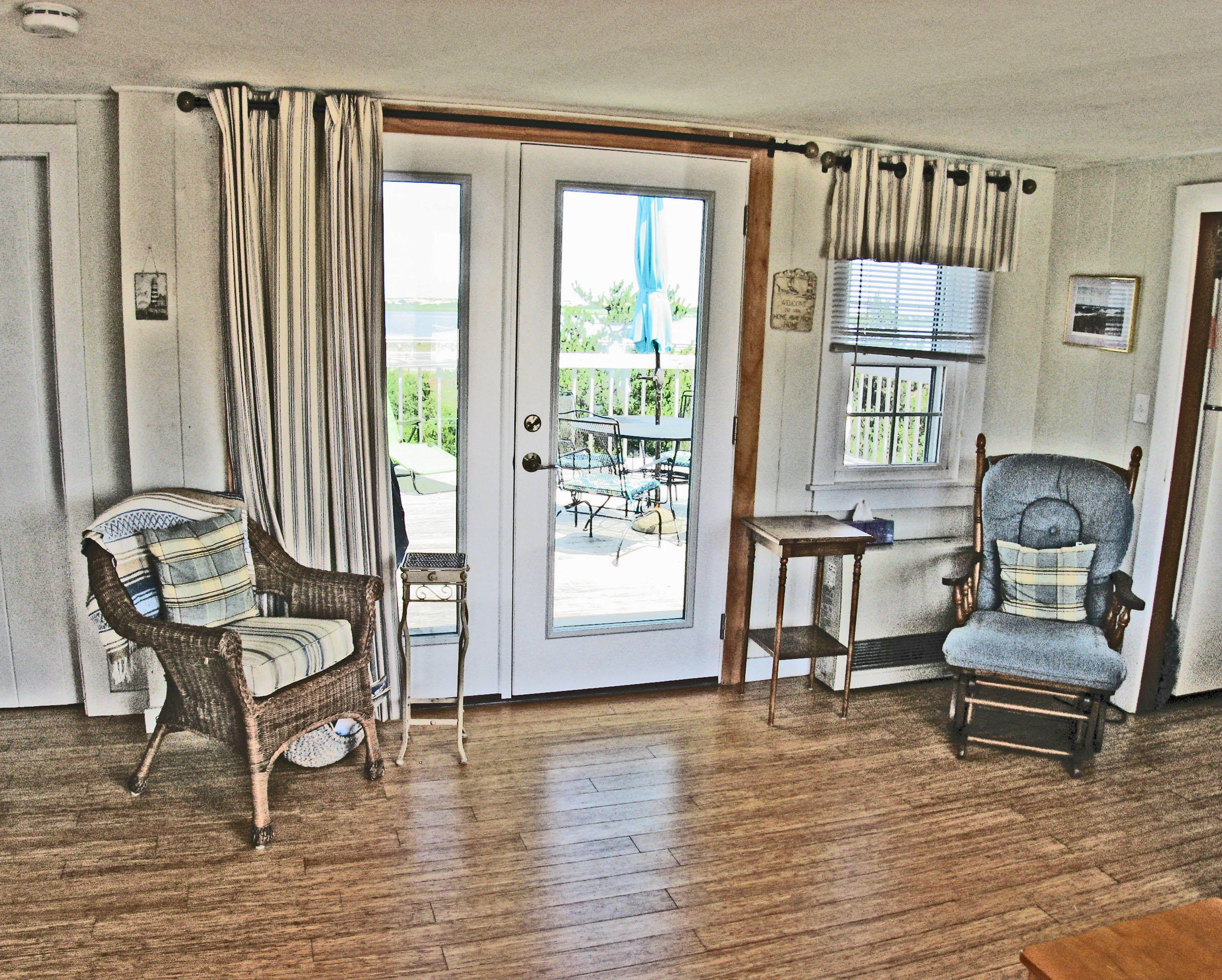 445 Shore Road Truro, MA 02666 - Photo 3 of 14 Living Room to deck from front door