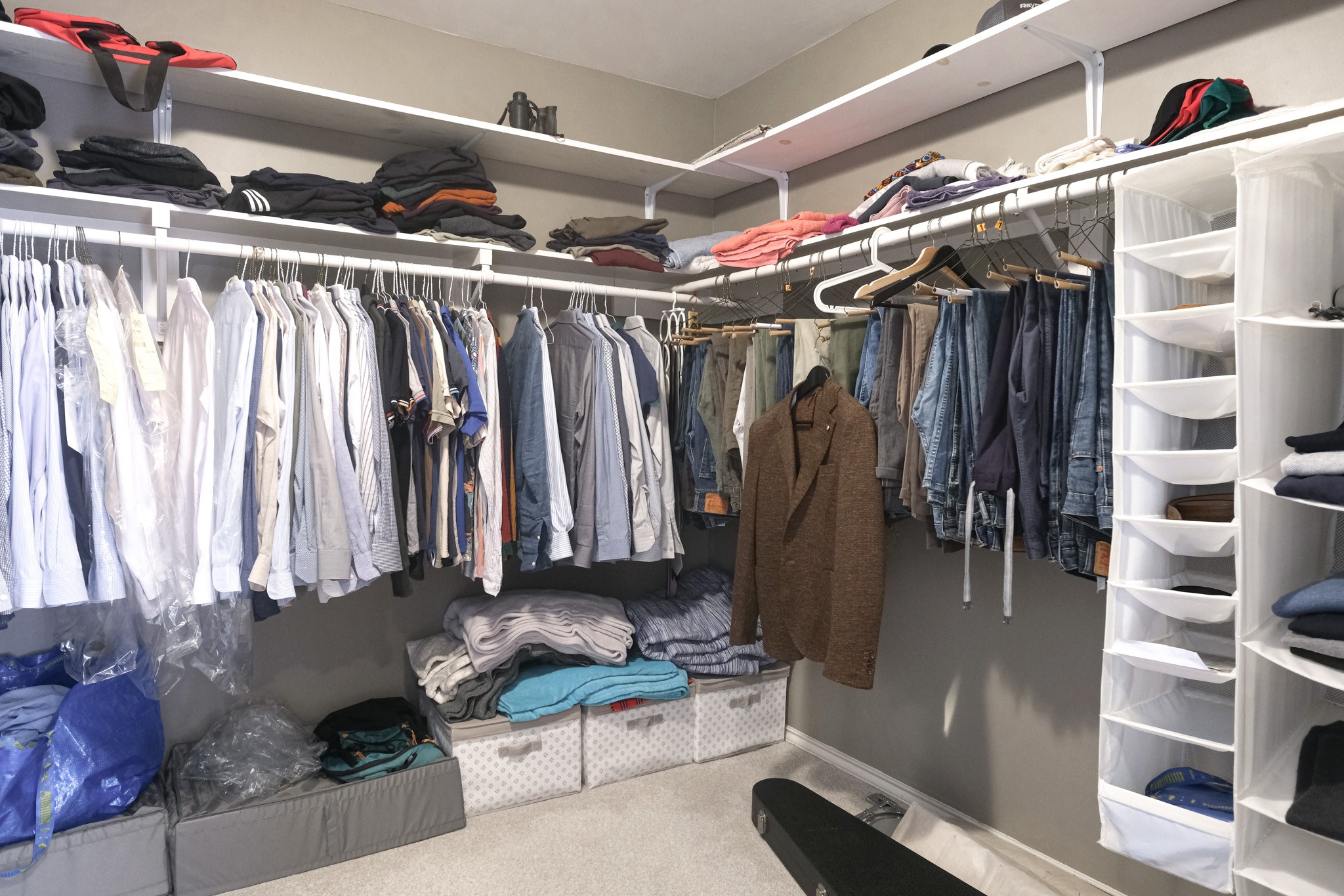 2609 Link Road Houston, TX 77009 - Photo 12 of 21 a view of walk in closet with clothes and shoes