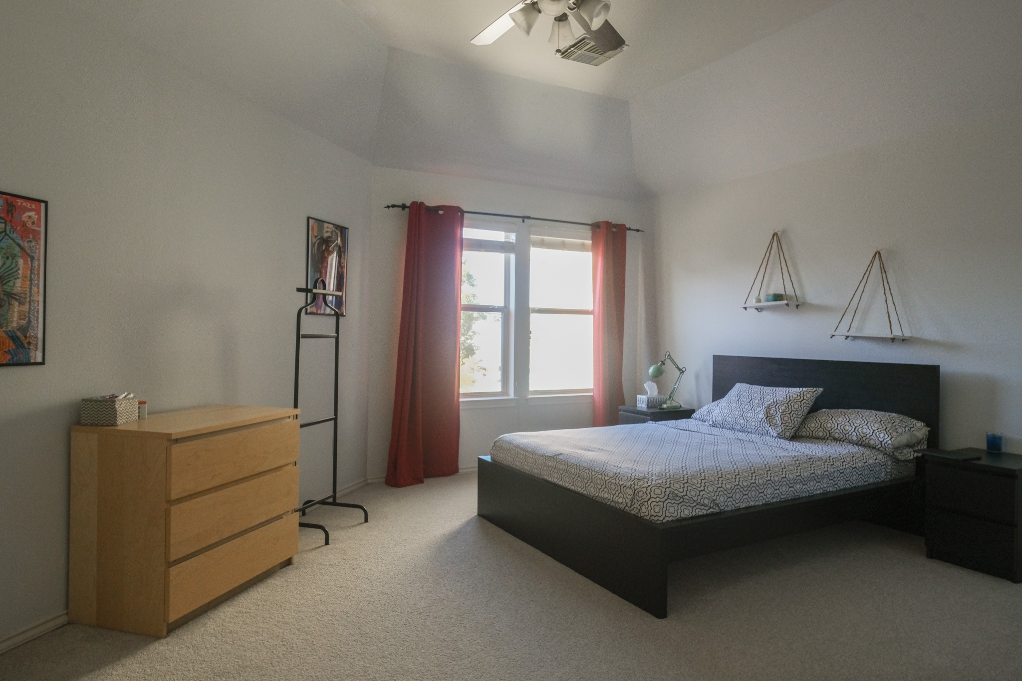 2609 Link Road Houston, TX 77009 - Photo 16 of 21 a bedroom with a bed and a dresser