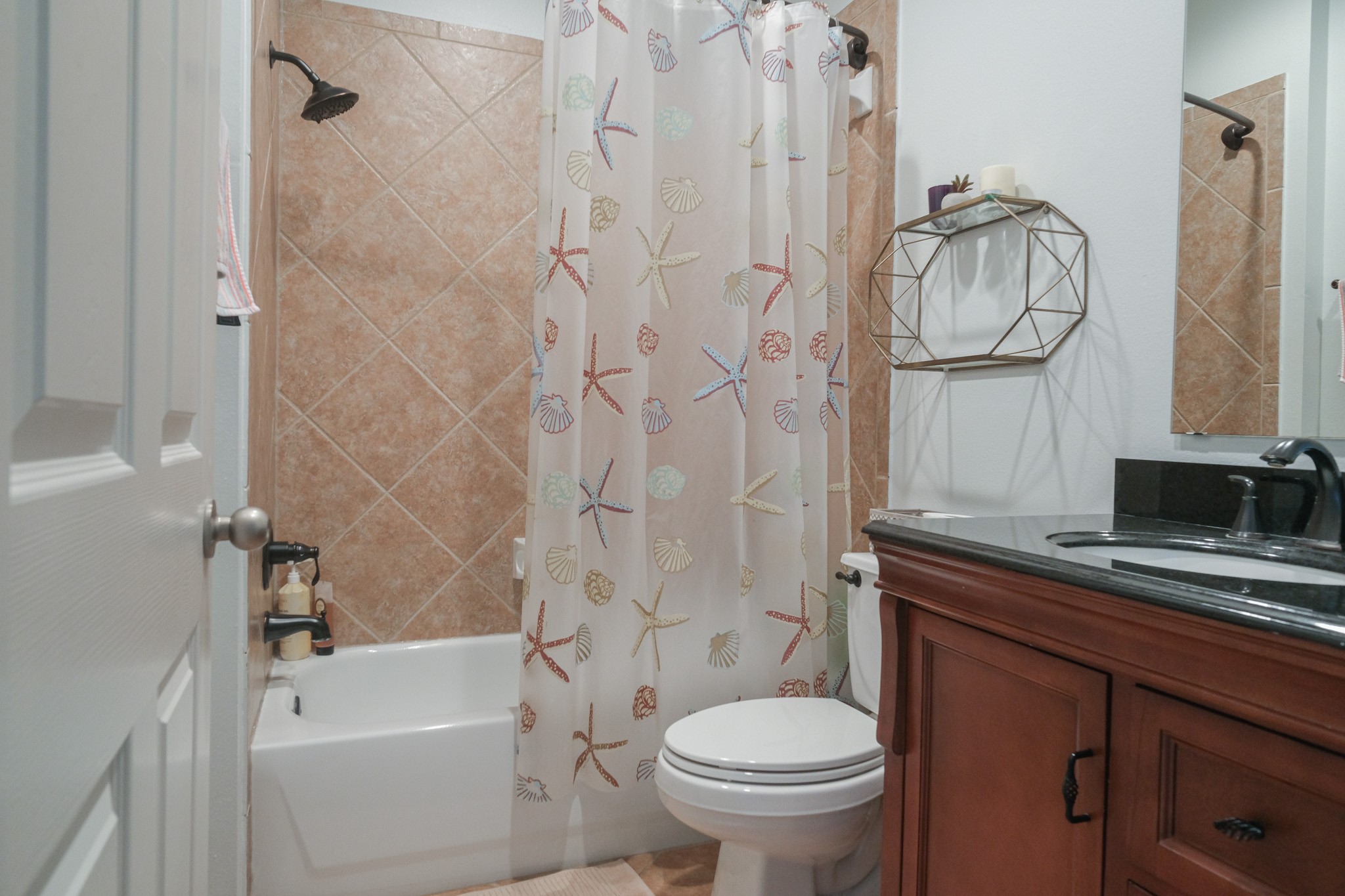 2609 Link Road Houston, TX 77009 - Photo 17 of 21 a bathroom with a sink a toilet and shower