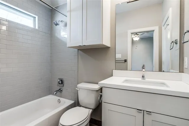 a bathroom with a sink toilet and a bathtub