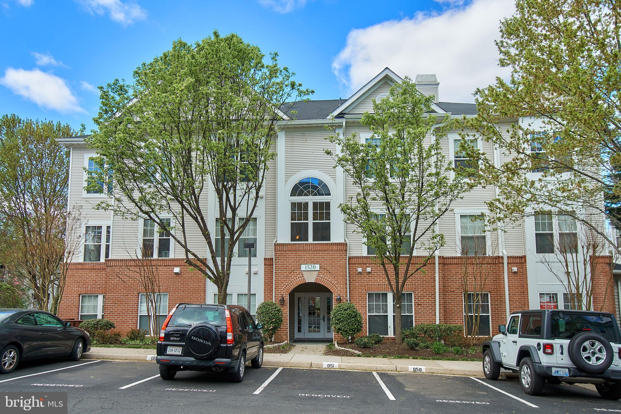 1520 North Point Drive, Unit 303 Reston, VA 20194 - Photo 1 of 29 Wooded community. Front door secure entrance.