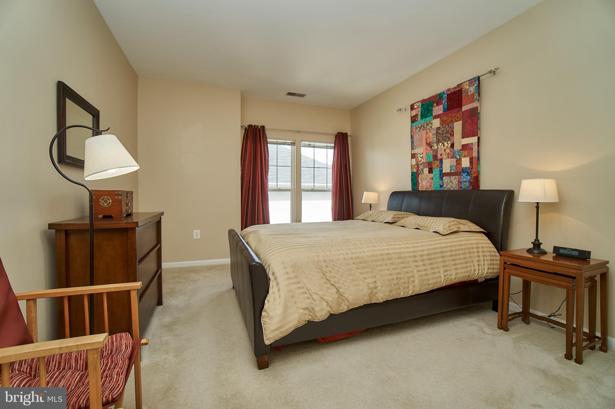 1520 North Point Drive, Unit 303 Reston, VA 20194 - Photo 15 of 29 Master bedroom.