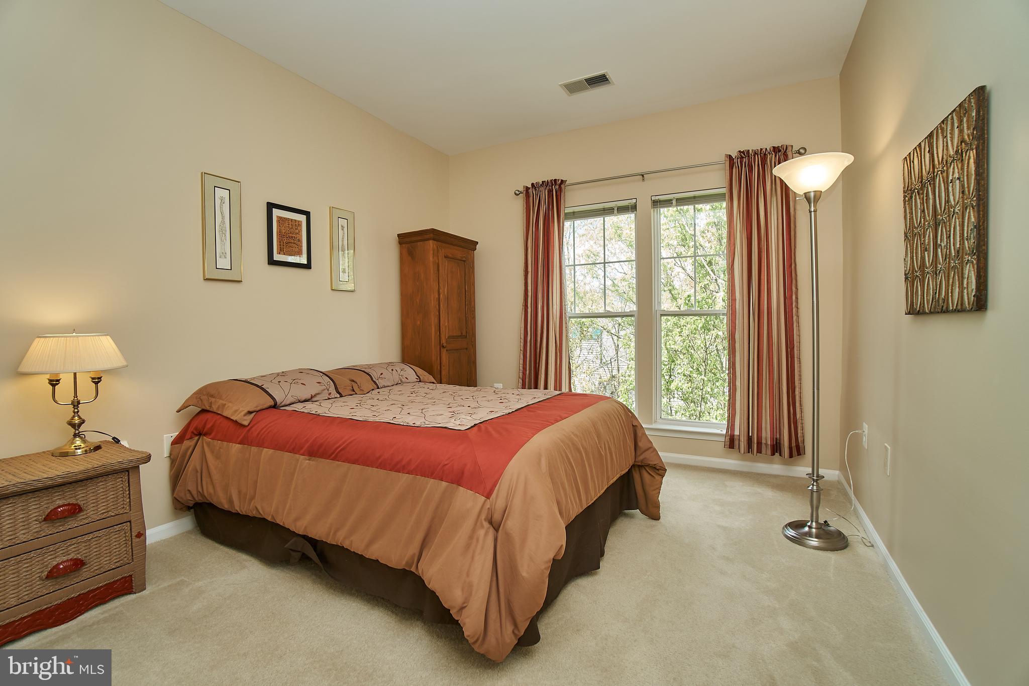 1520 North Point Drive, Unit 303 Reston, VA 20194 - Photo 18 of 29 2nd of 3 bedrooms. Walk-in closet. Nice window.