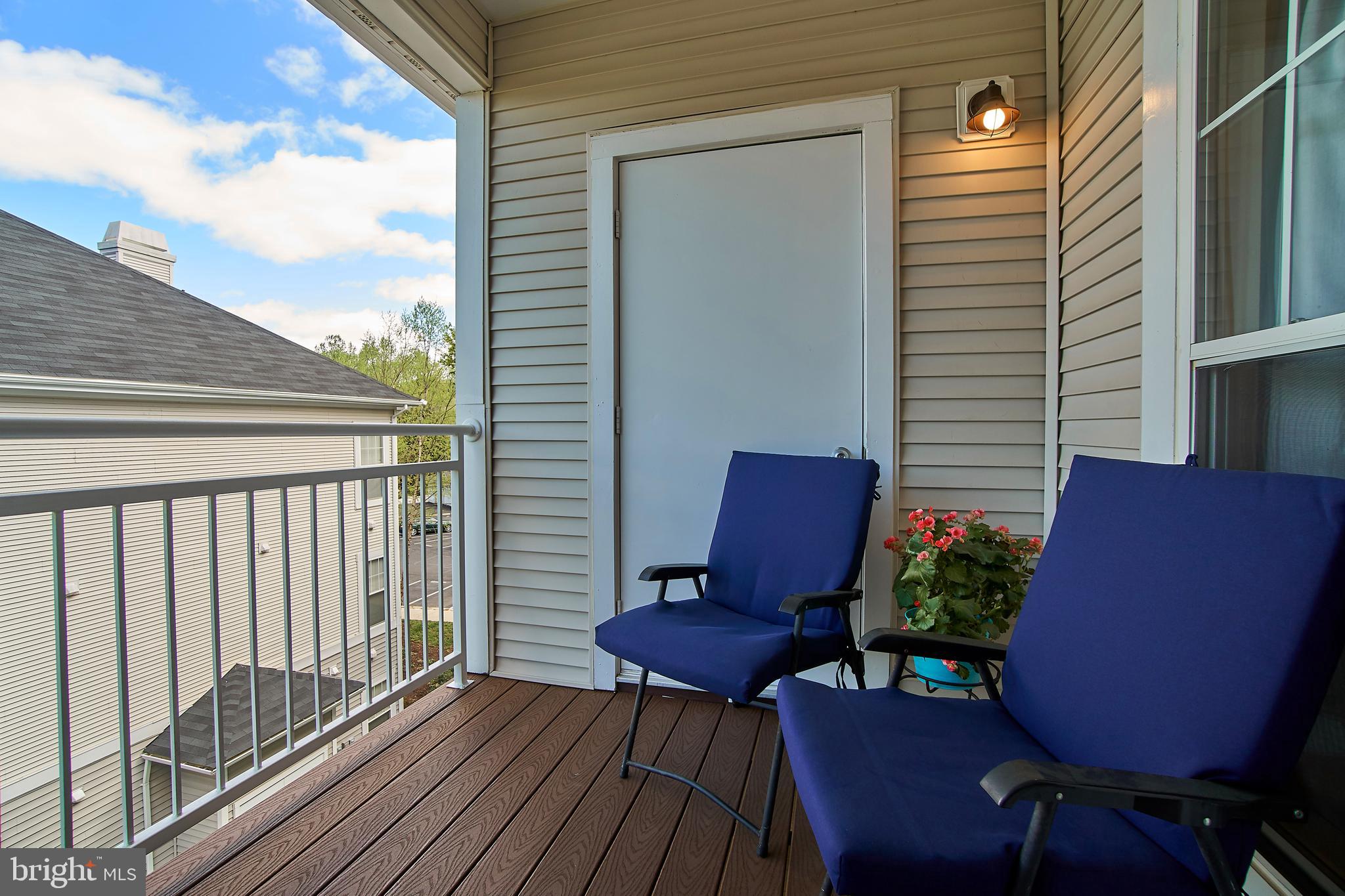 1520 North Point Drive, Unit 303 Reston, VA 20194 - Photo 22 of 29 Covered private balcony. Grow cooking herbs.