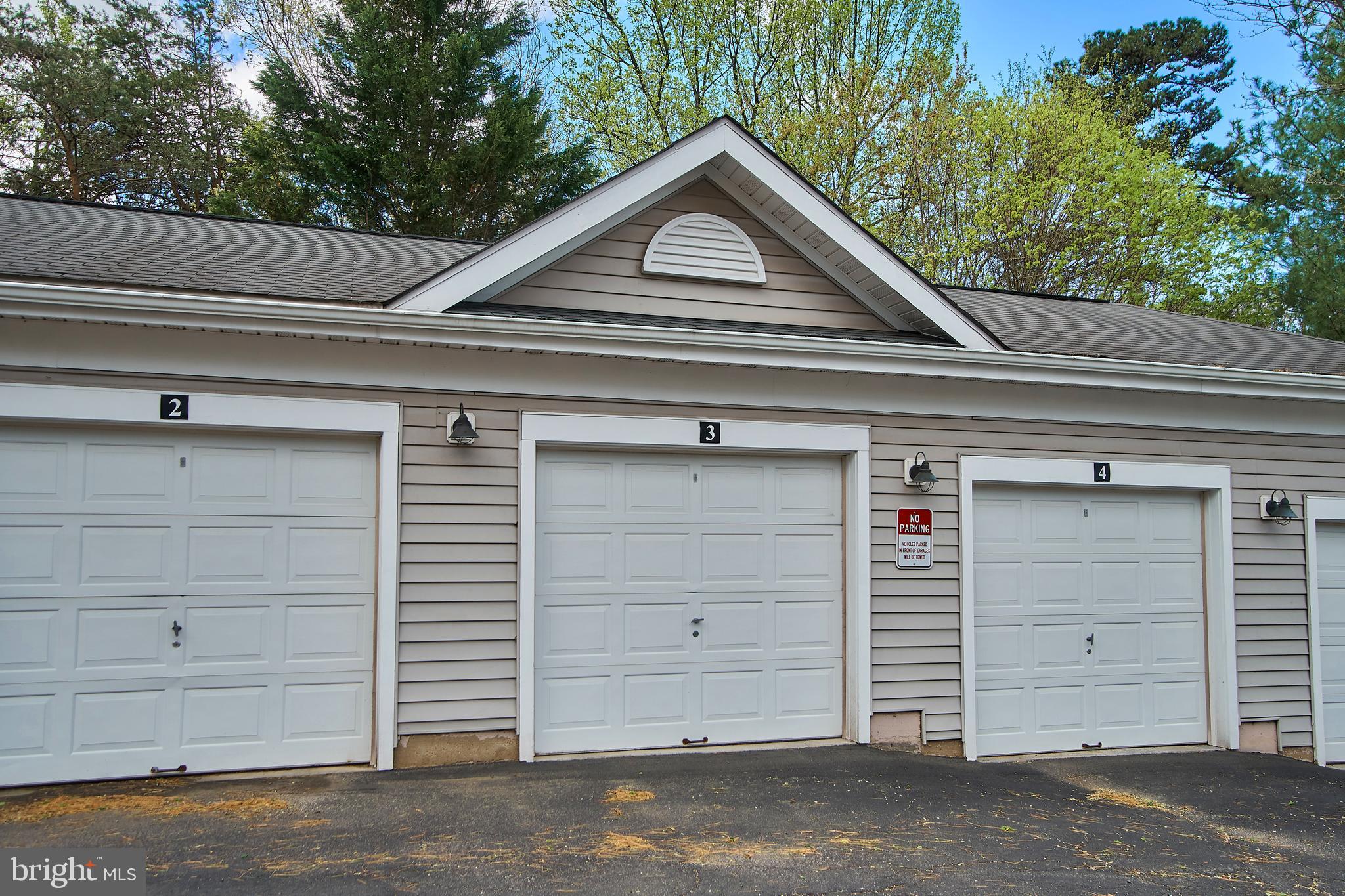 1520 North Point Drive, Unit 303 Reston, VA 20194 - Photo 24 of 29 Your own garage. Shelving inside, too.