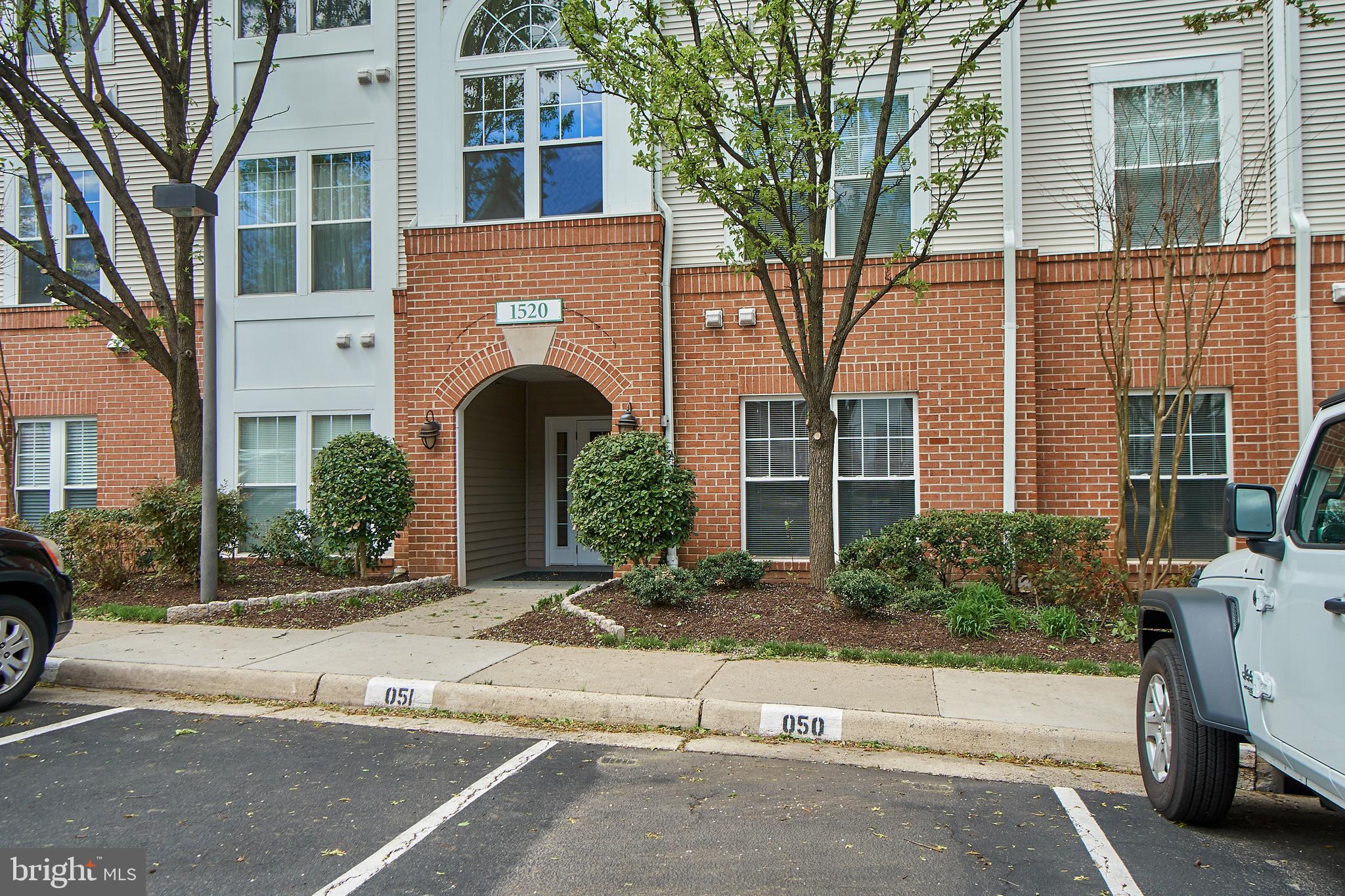 1520 North Point Drive, Unit 303 Reston, VA 20194 - Photo 25 of 29 Garage plus assigned parking right next to entry.