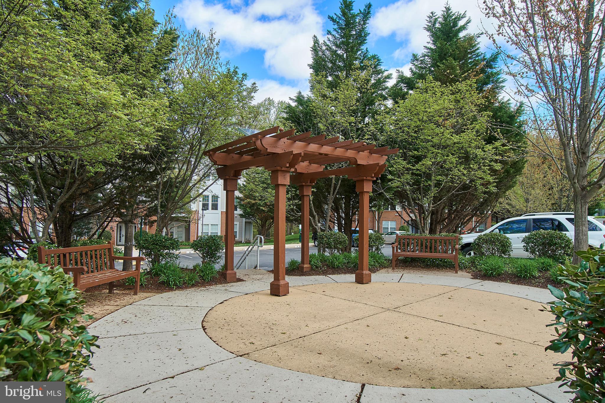 1520 North Point Drive, Unit 303 Reston, VA 20194 - Photo 26 of 29 Community pergola is site of neighborhood picnics.