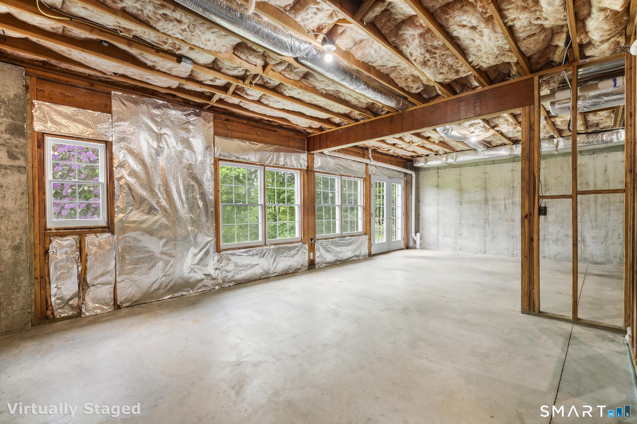 12 Logans Way Danbury, CT 06811 - Photo 38 of 40 a view of an empty room with windows
