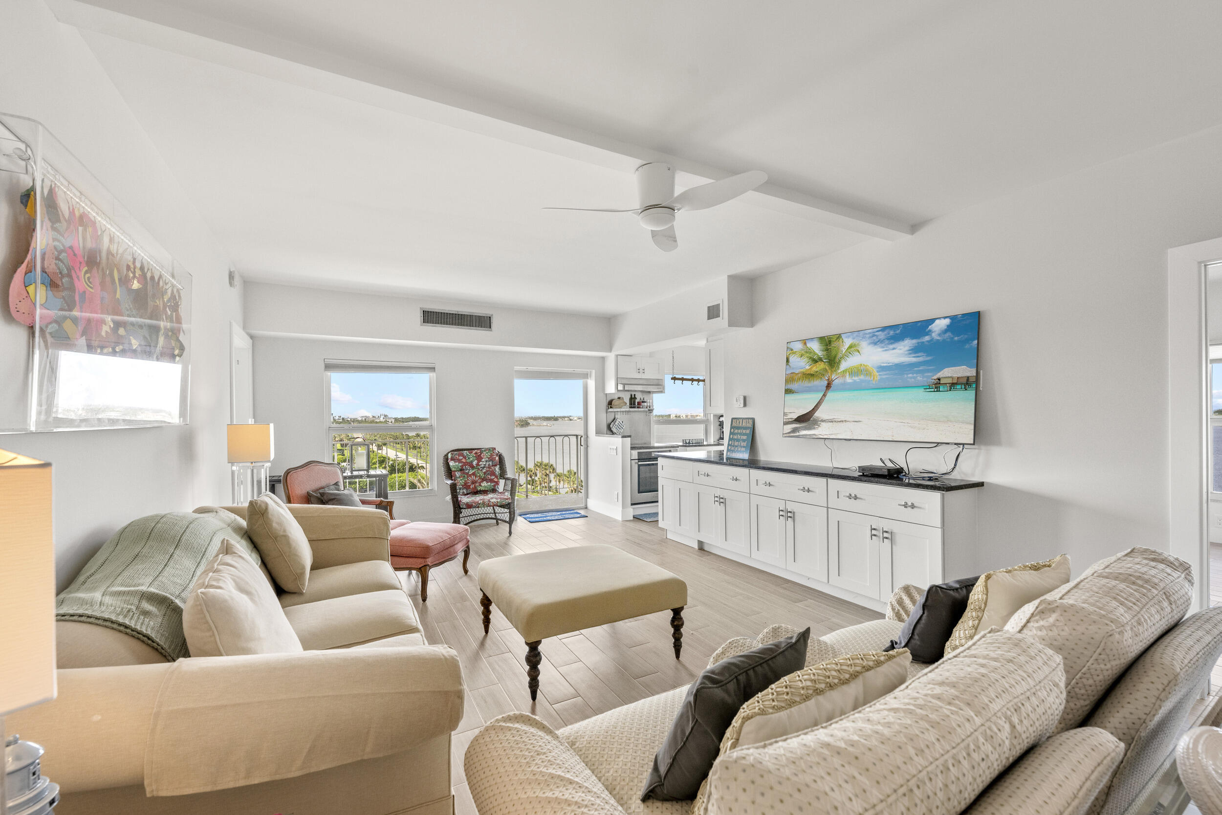 3230 South Ocean Boulevard, Unit A602 Palm Beach, FL 33480 - Photo 11 of 87 a living room with furniture and a wooden floor