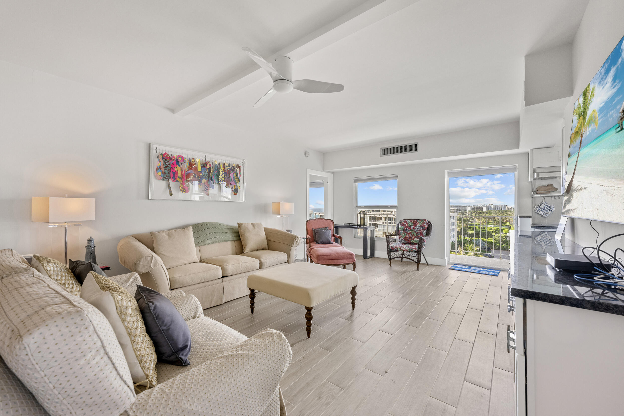3230 South Ocean Boulevard, Unit A602 Palm Beach, FL 33480 - Photo 12 of 87 a living room with furniture and a large window