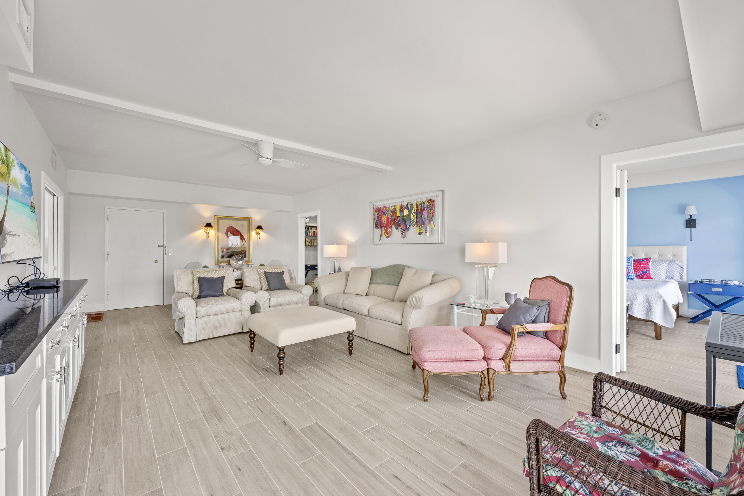 3230 South Ocean Boulevard, Unit A602 Palm Beach, FL 33480 - Photo 13 of 87 a living room with furniture and a wooden floor