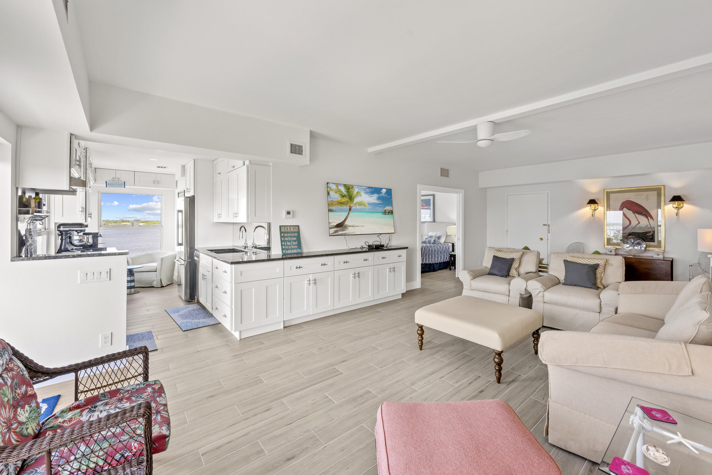 3230 South Ocean Boulevard, Unit A602 Palm Beach, FL 33480 - Photo 14 of 87 a living room with furniture and kitchen view