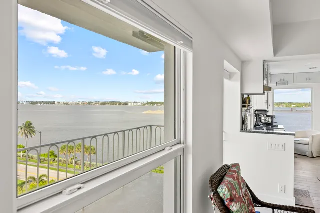 a view of balcony with potted plants