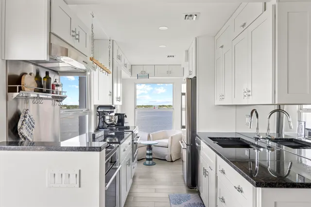 a bedroom with a bed and with a view of closet