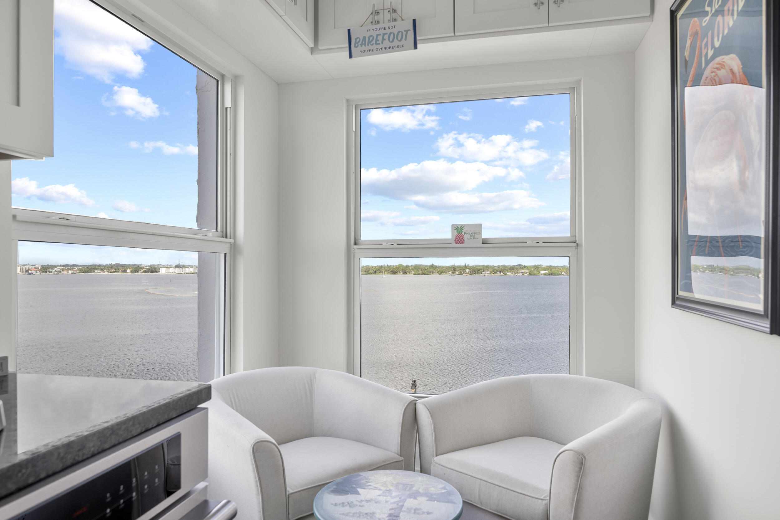3230 South Ocean Boulevard, Unit A602 Palm Beach, FL 33480 - Photo 20 of 87 a view of a livingroom with furniture and a window