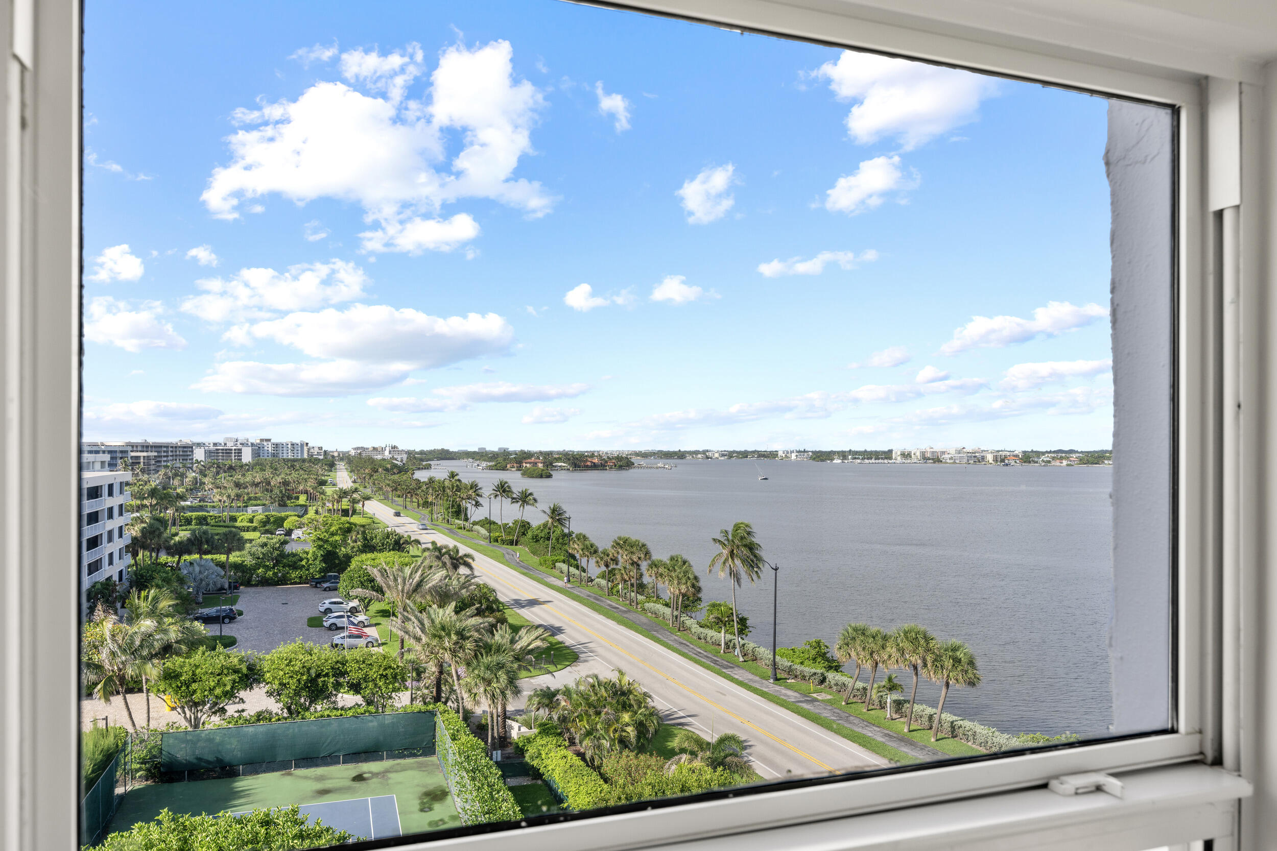 3230 South Ocean Boulevard, Unit A602 Palm Beach, FL 33480 - Photo 21 of 87 a view of a lake from a window