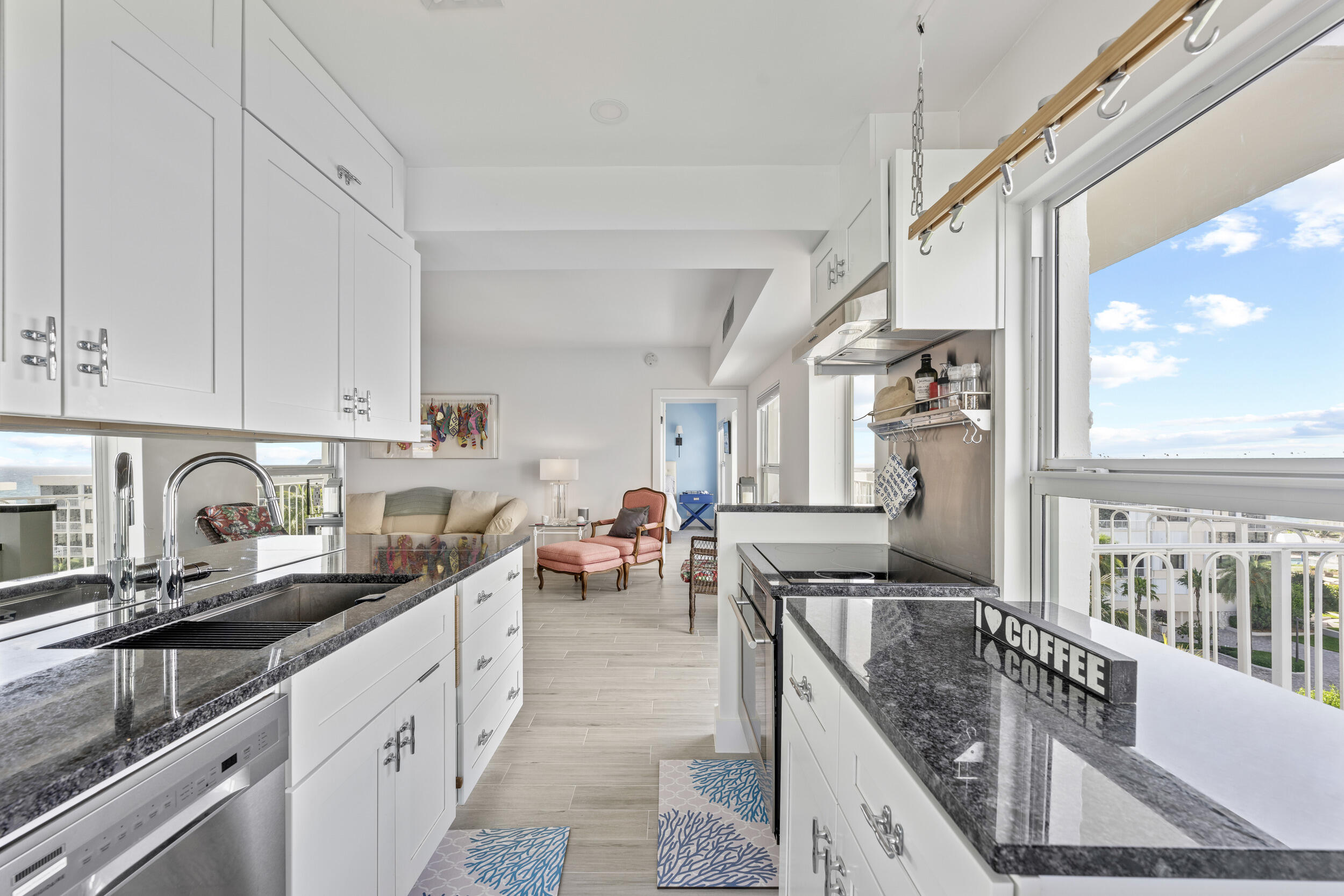 3230 South Ocean Boulevard, Unit A602 Palm Beach, FL 33480 - Photo 22 of 87 a kitchen with stainless steel appliances granite countertop a sink a stove and cabinets