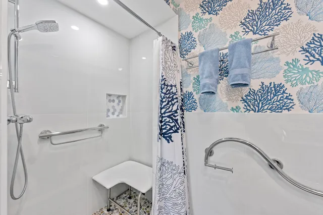 a view of a swimming pool with a patio