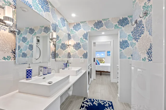 a view of building with swimming pool and outdoor seating