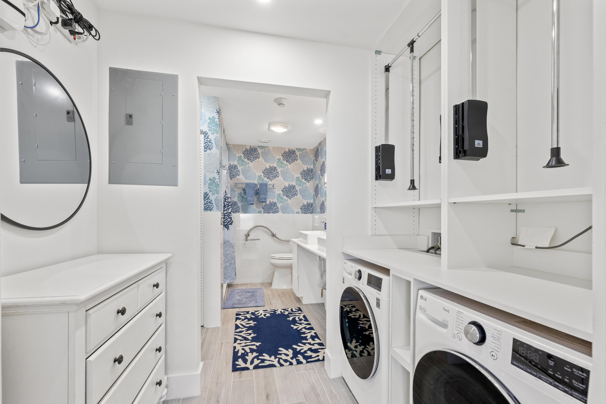 3230 South Ocean Boulevard, Unit A602 Palm Beach, FL 33480 - Photo 43 of 87 a view of bathroom with washing machine and mirror