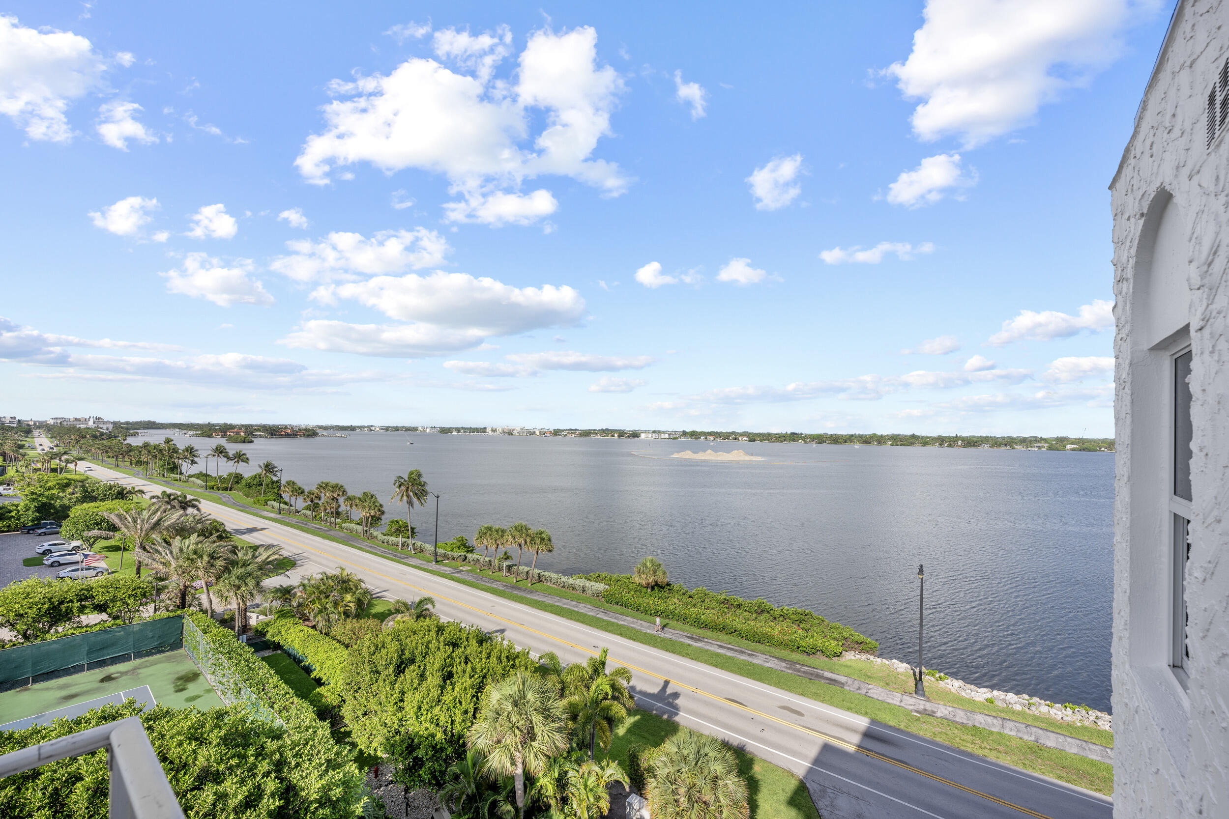 3230 South Ocean Boulevard, Unit A602 Palm Beach, FL 33480 - Photo 5 of 87 a view of a lake from a balcony