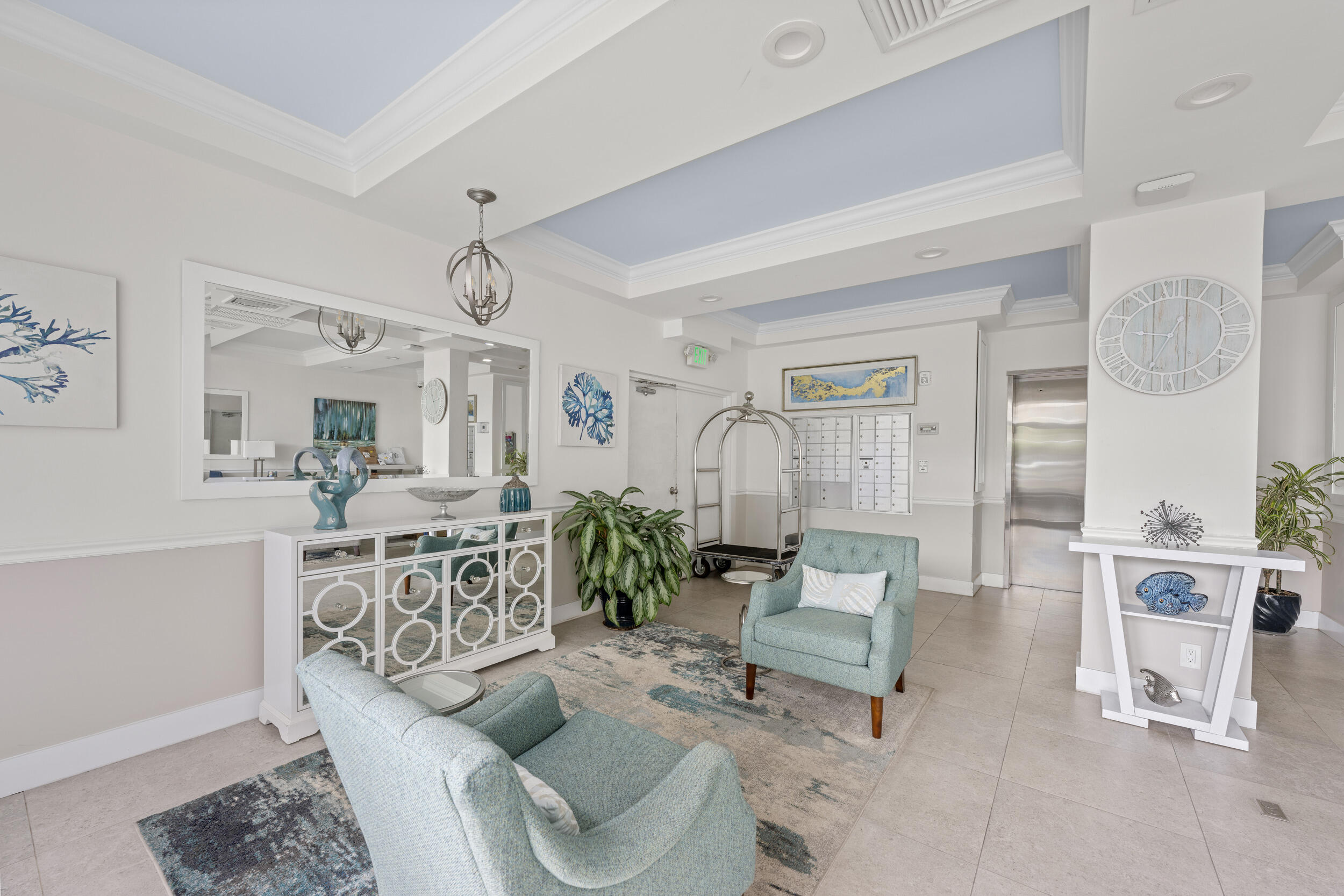 3230 South Ocean Boulevard, Unit A602 Palm Beach, FL 33480 - Photo 51 of 87 a living room with furniture and a table