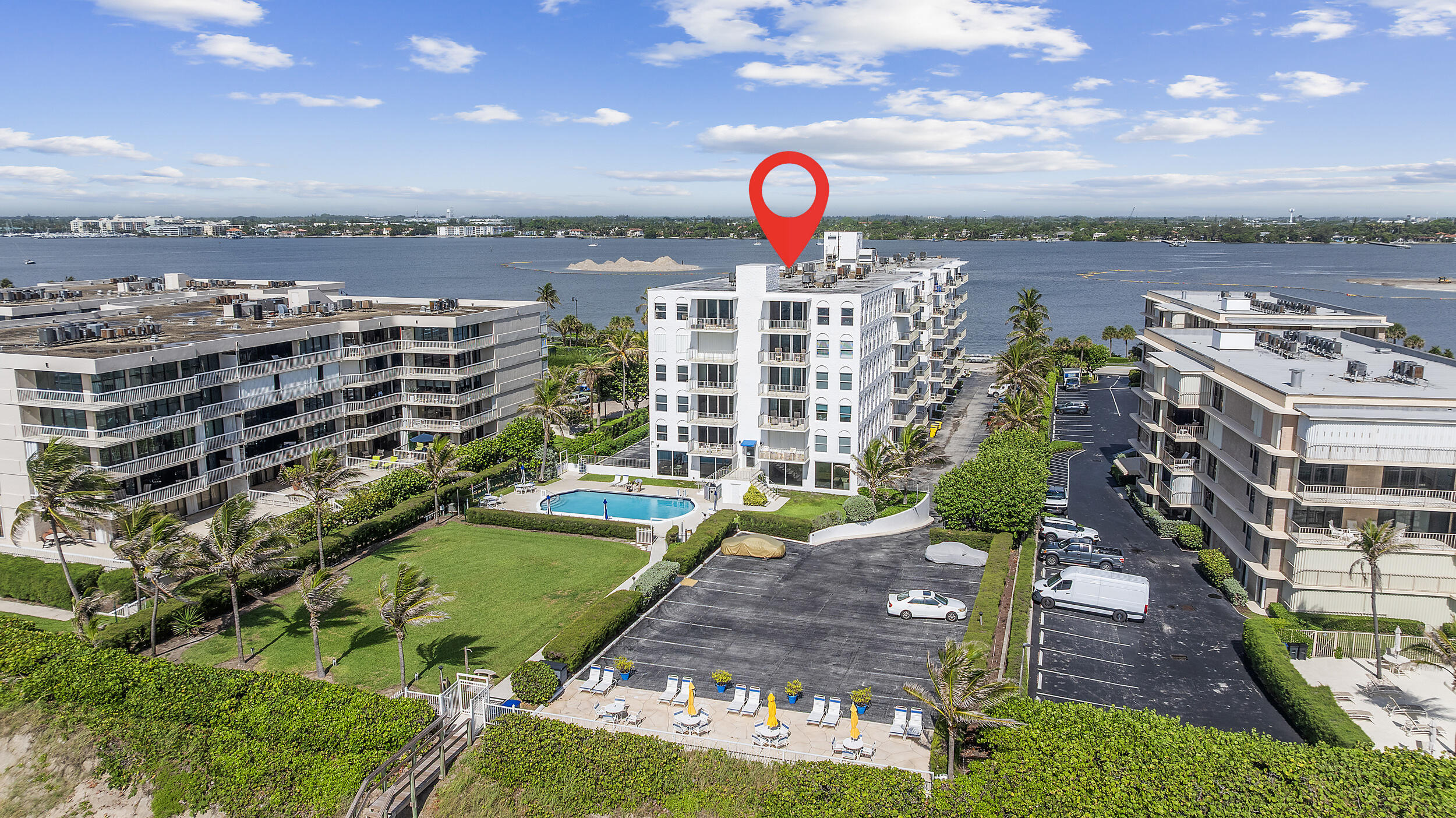 3230 South Ocean Boulevard, Unit A602 Palm Beach, FL 33480 - Photo 83 of 87 a view of a swimming pool with a yard and seating area