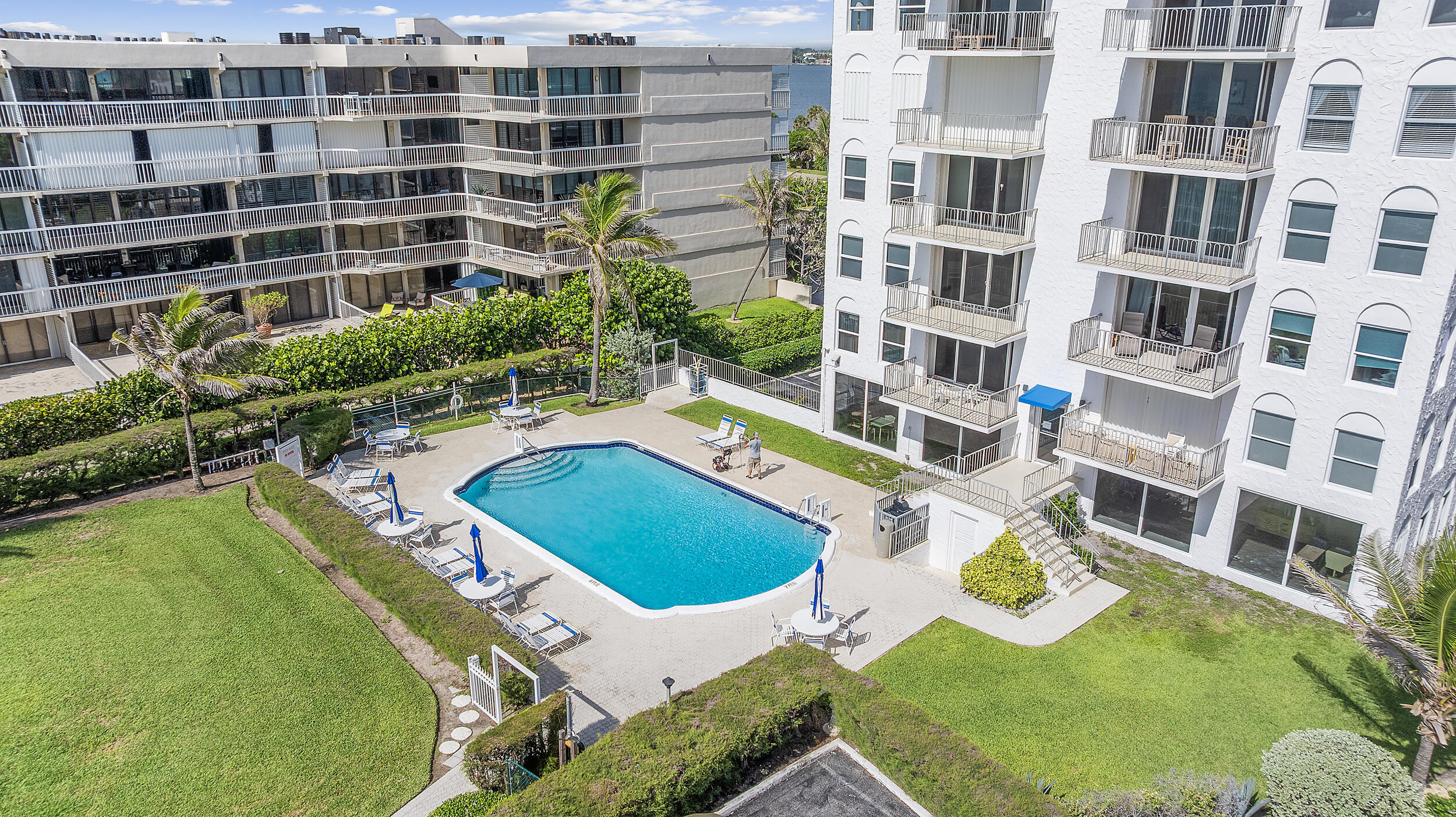 3230 South Ocean Boulevard, Unit A602 Palm Beach, FL 33480 - Photo 85 of 87 a aerial view of a house with a swimming pool and outdoor seating