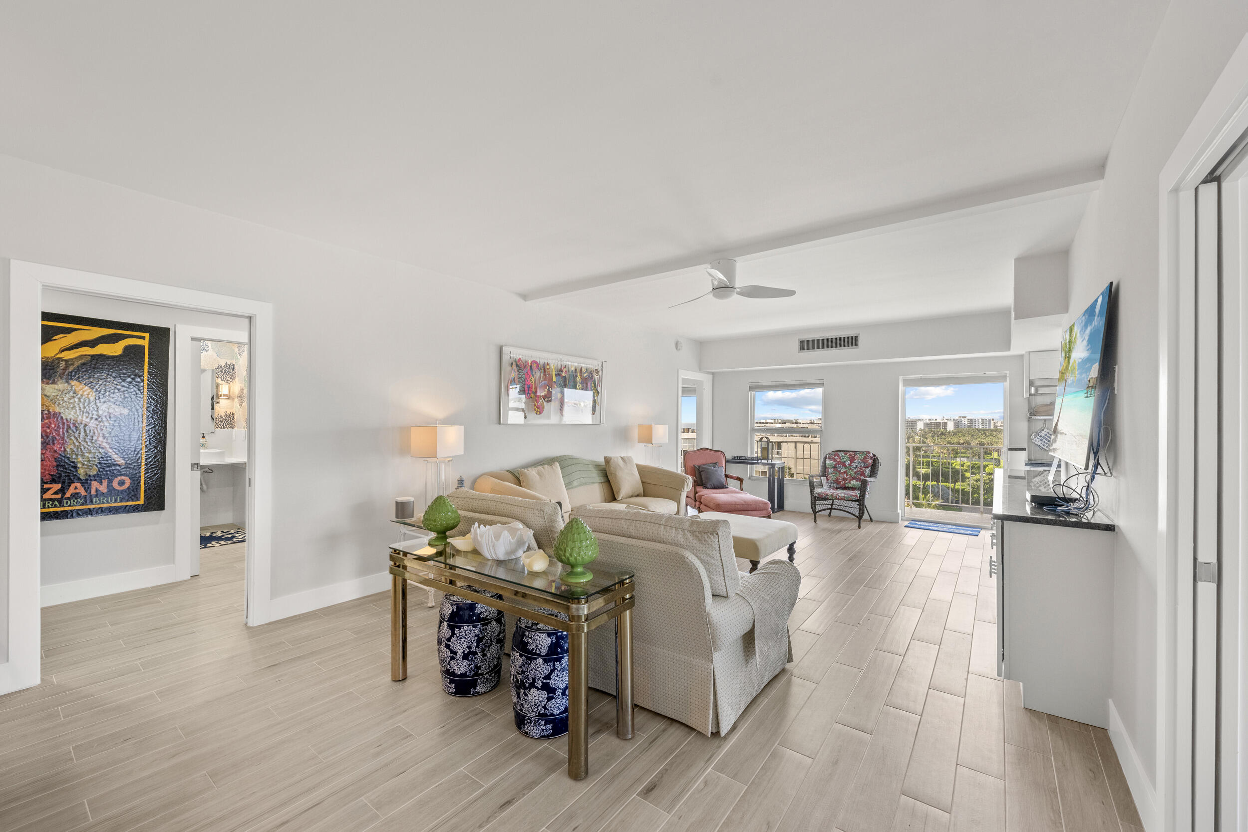 3230 South Ocean Boulevard, Unit A602 Palm Beach, FL 33480 - Photo 9 of 87 a living room with furniture and a wooden floor