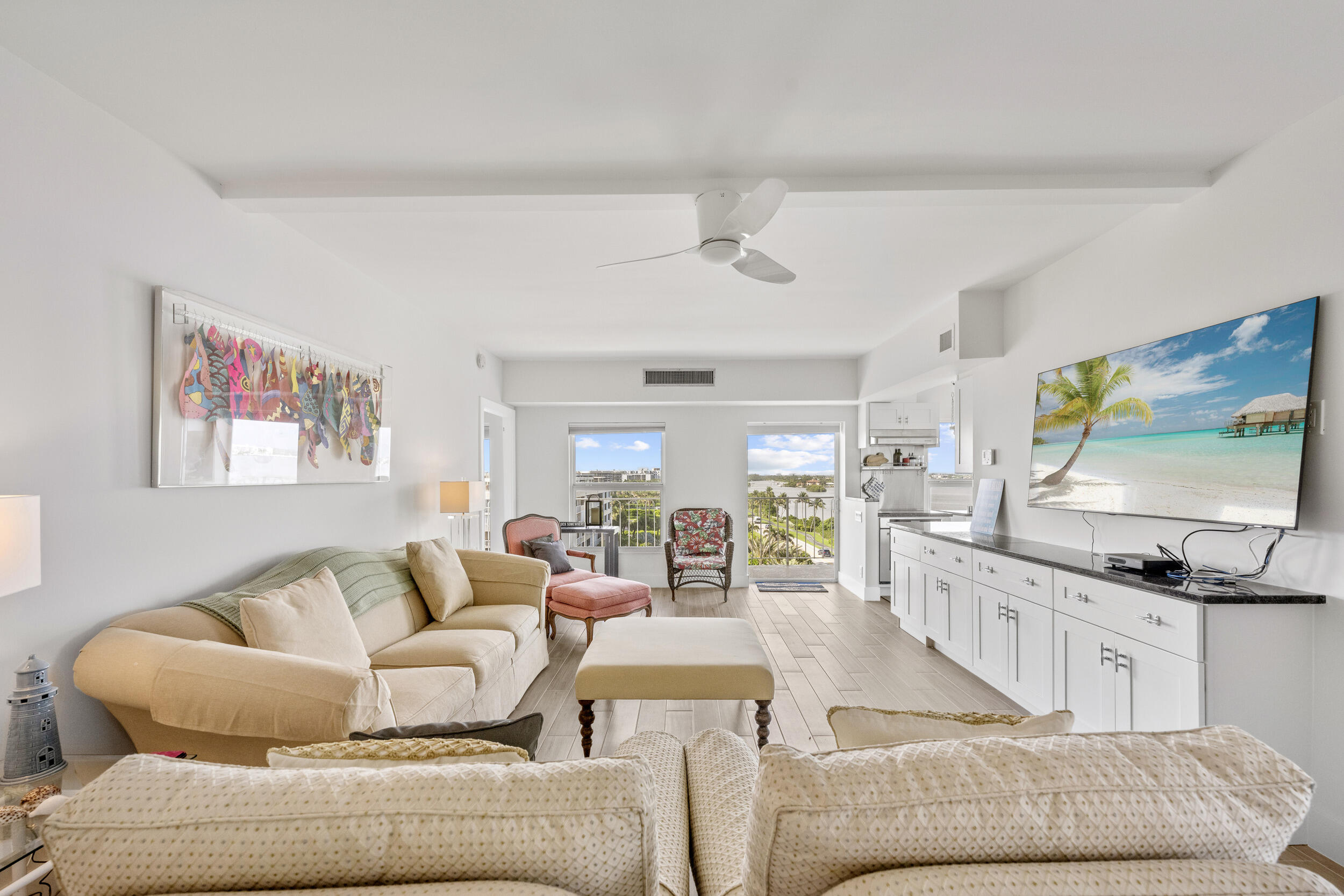 3230 South Ocean Boulevard, Unit A602 Palm Beach, FL 33480 - Photo 10 of 87 a living room with furniture and a flat screen tv