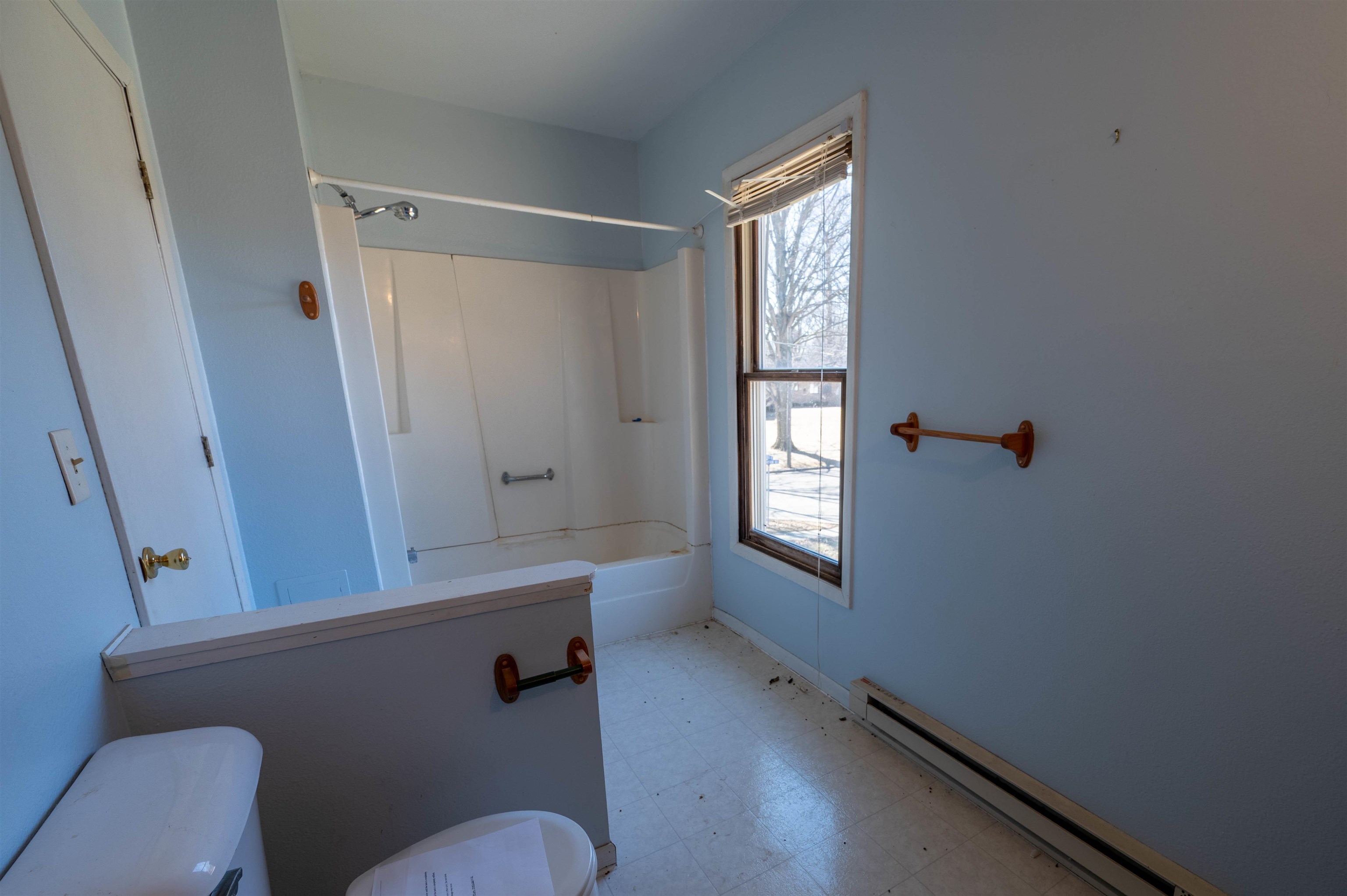502 East Brayton Road Mount Morris, IL 61054 - Photo 13 of 19 a bathroom with a window vanity and toilet