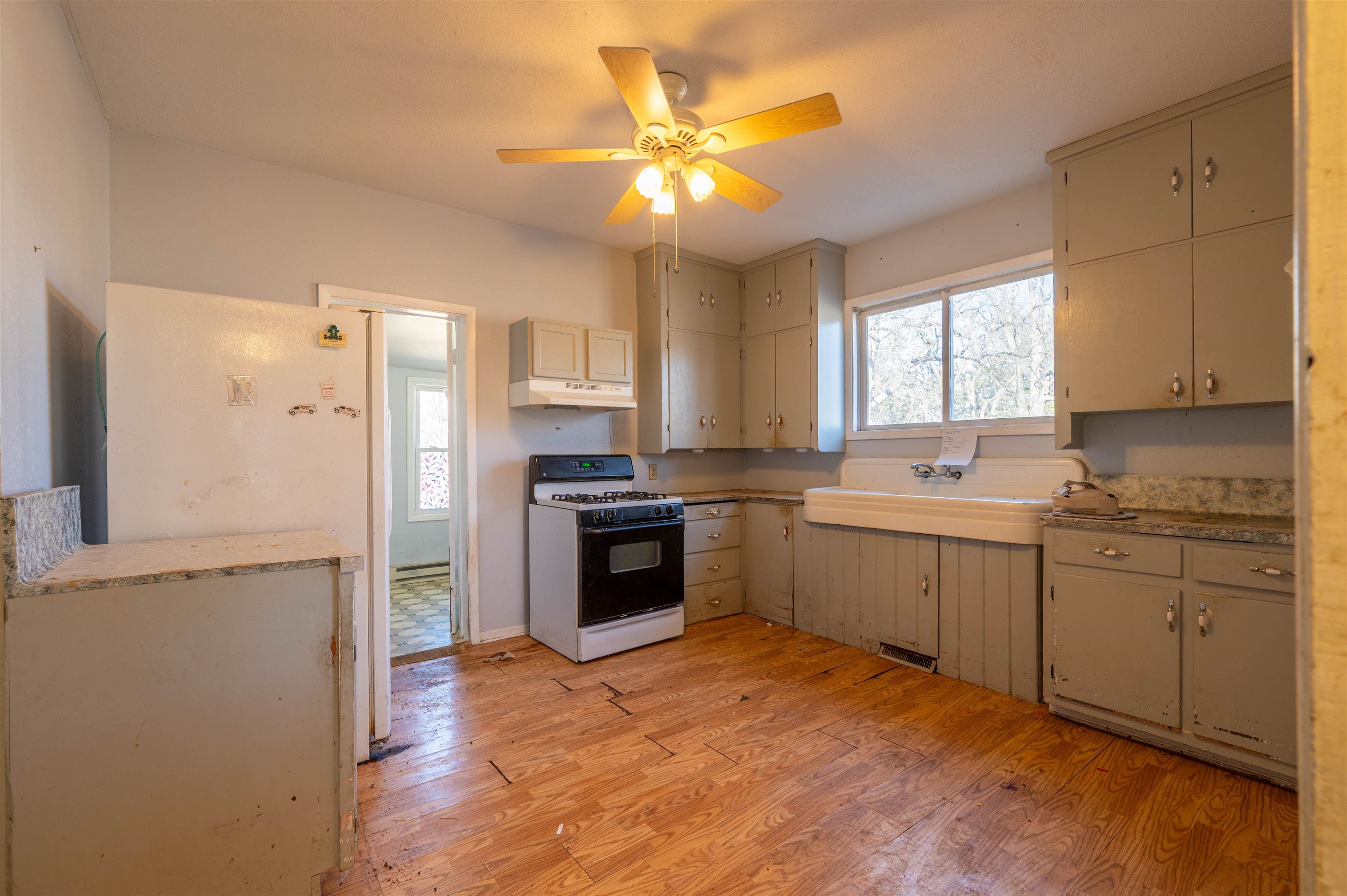 502 East Brayton Road Mount Morris, IL 61054 - Photo 10 of 19 a kitchen with a refrigerator stove and sink