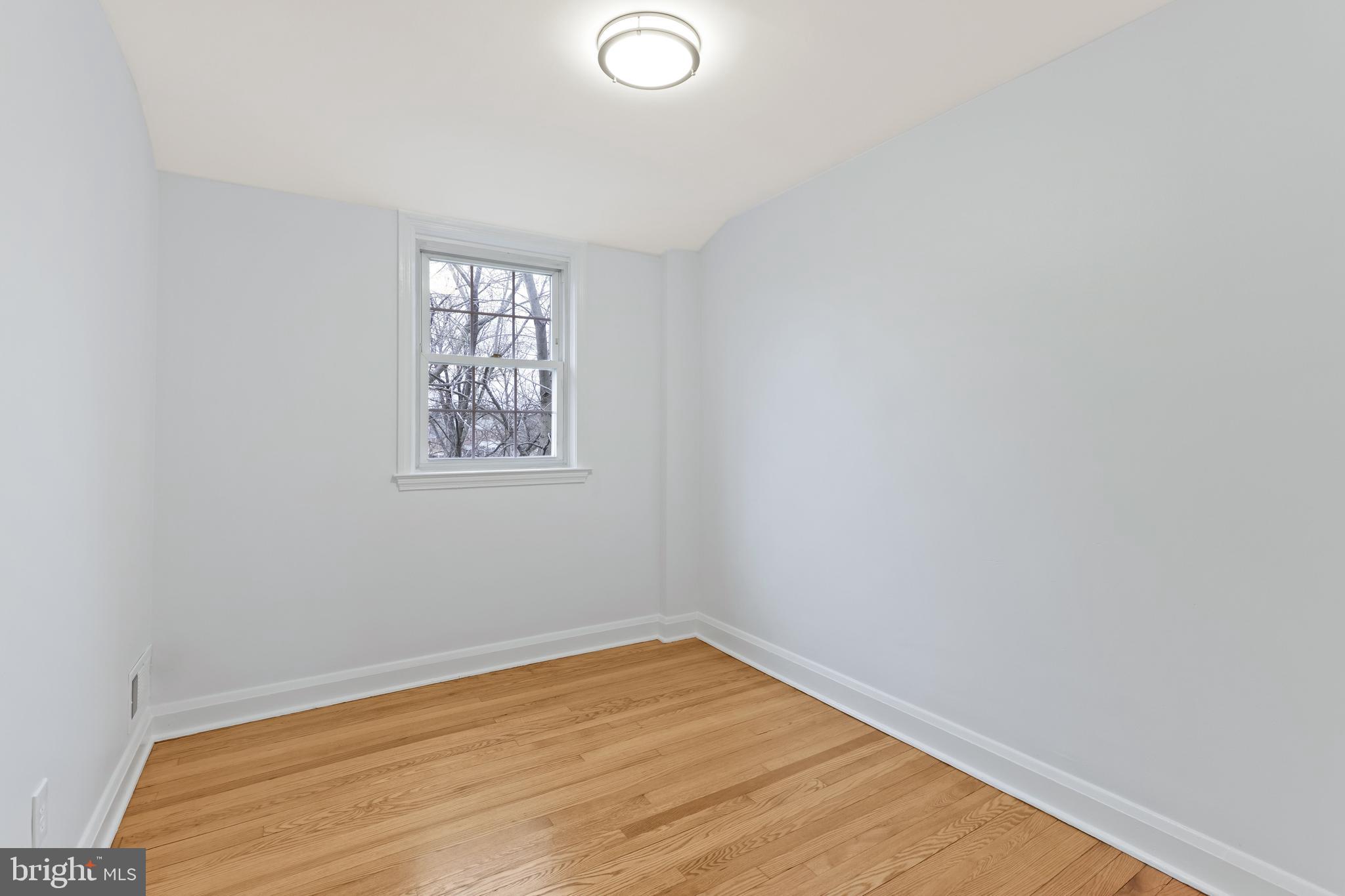 1667 Hardwick Road Towson, MD 21286 - Photo 13 of 34 an empty room with a window