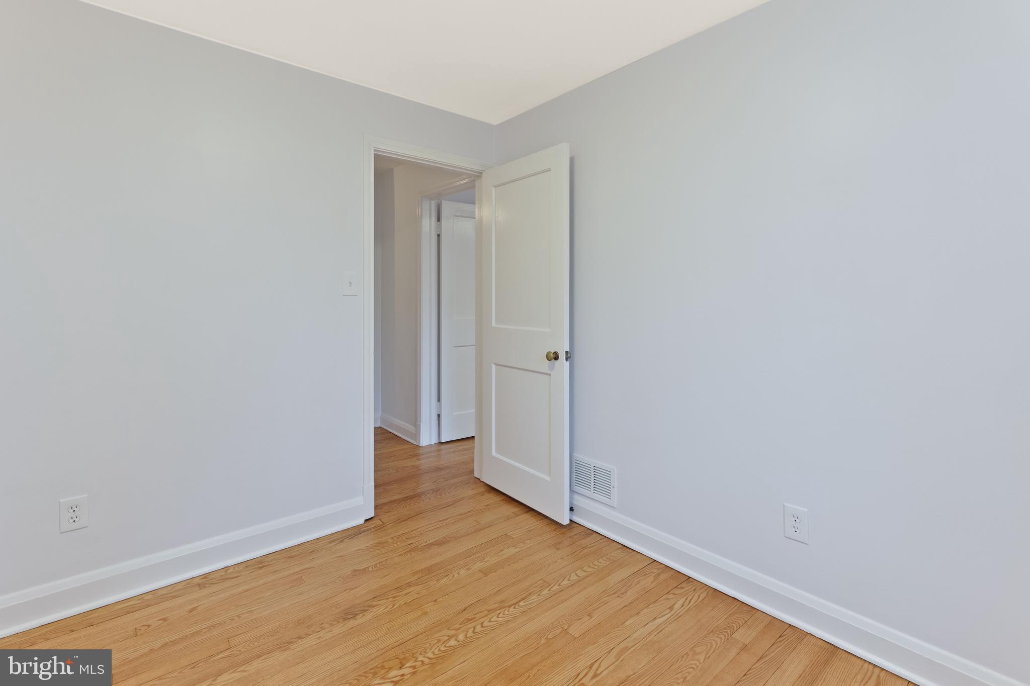 1667 Hardwick Road Towson, MD 21286 - Photo 14 of 34 a view of an empty room with wooden floor
