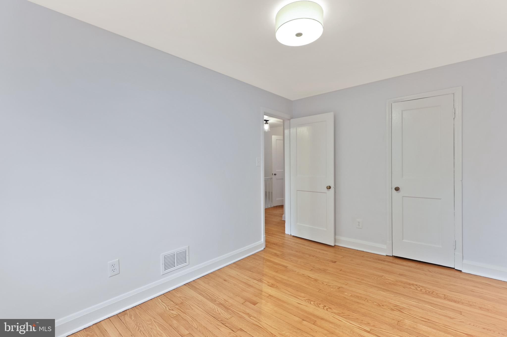 1667 Hardwick Road Towson, MD 21286 - Photo 15 of 34 a view of an empty room with wooden floor