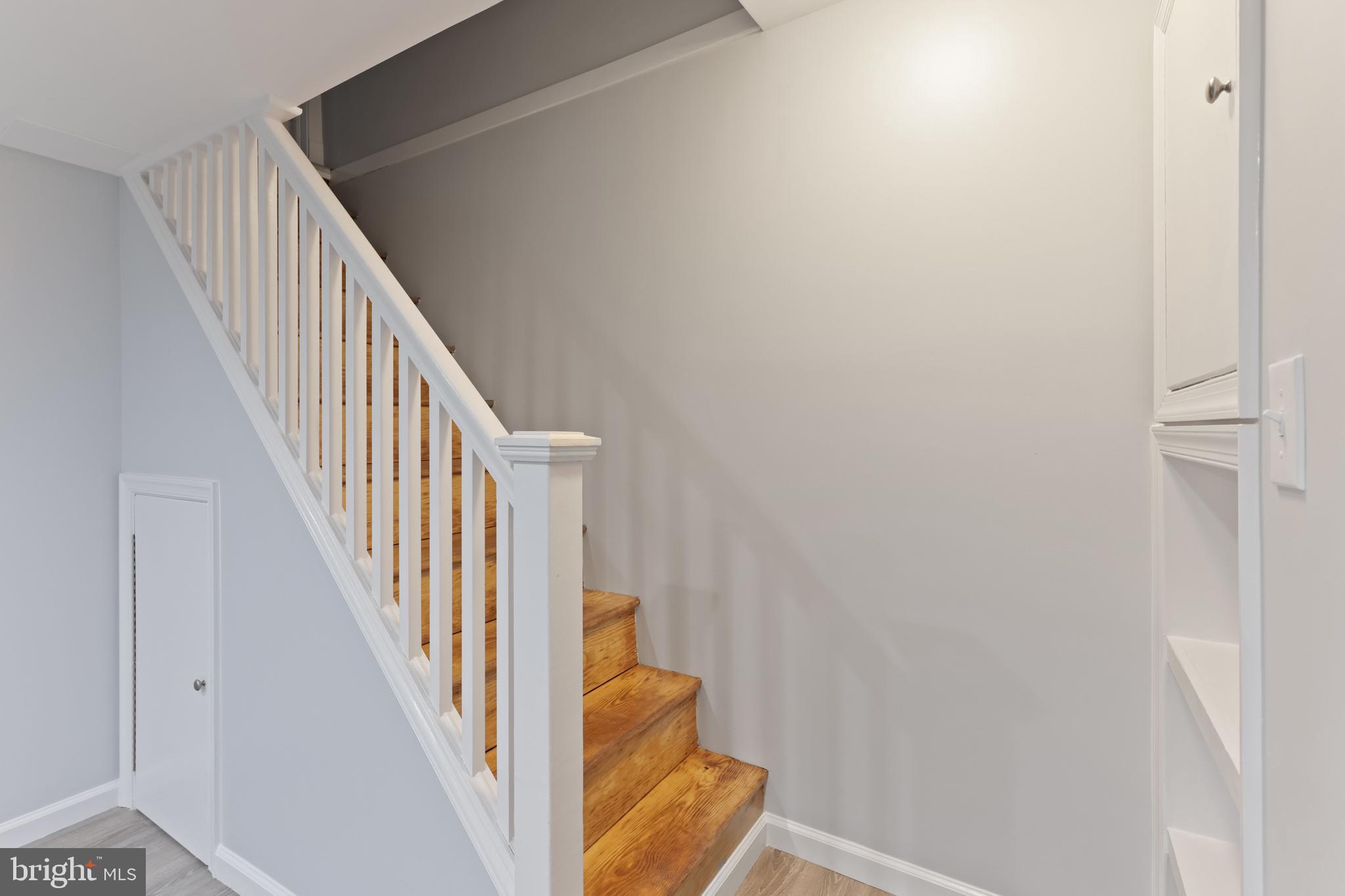 1667 Hardwick Road Towson, MD 21286 - Photo 23 of 34 a view of staircase with railing and white walls