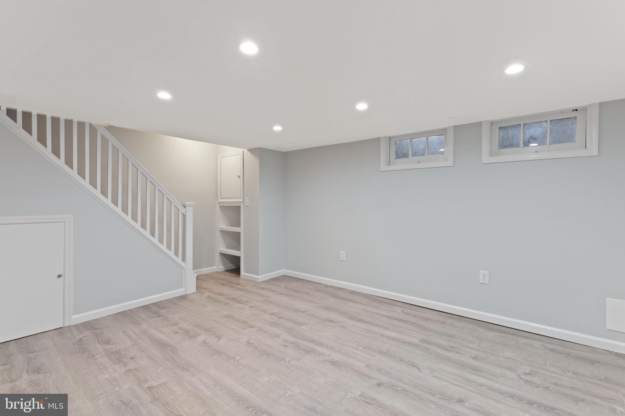 1667 Hardwick Road Towson, MD 21286 - Photo 24 of 34 a view of an empty room with wooden floor