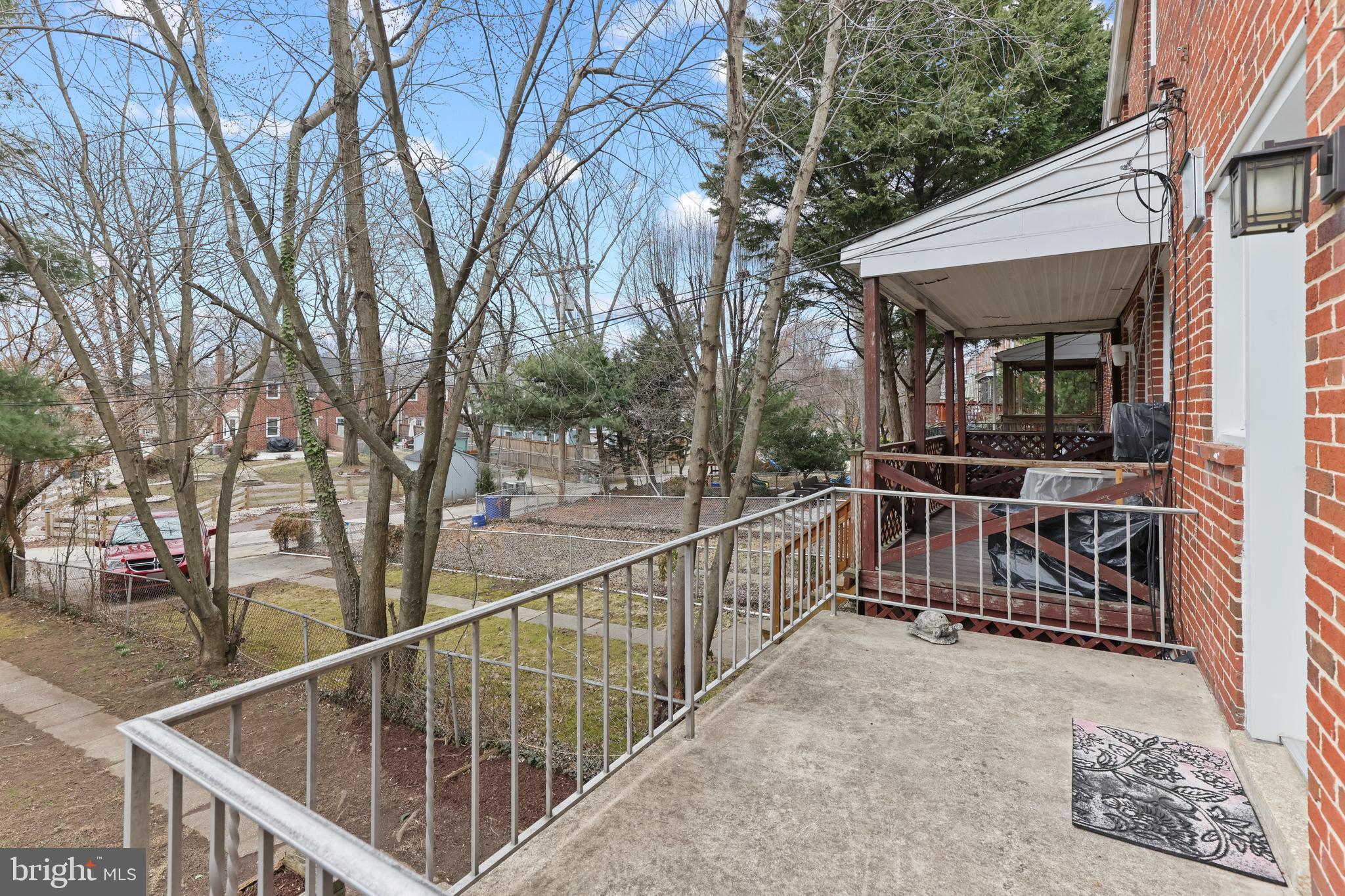 1667 Hardwick Road Towson, MD 21286 - Photo 31 of 34 a view of a house with backyard and deck