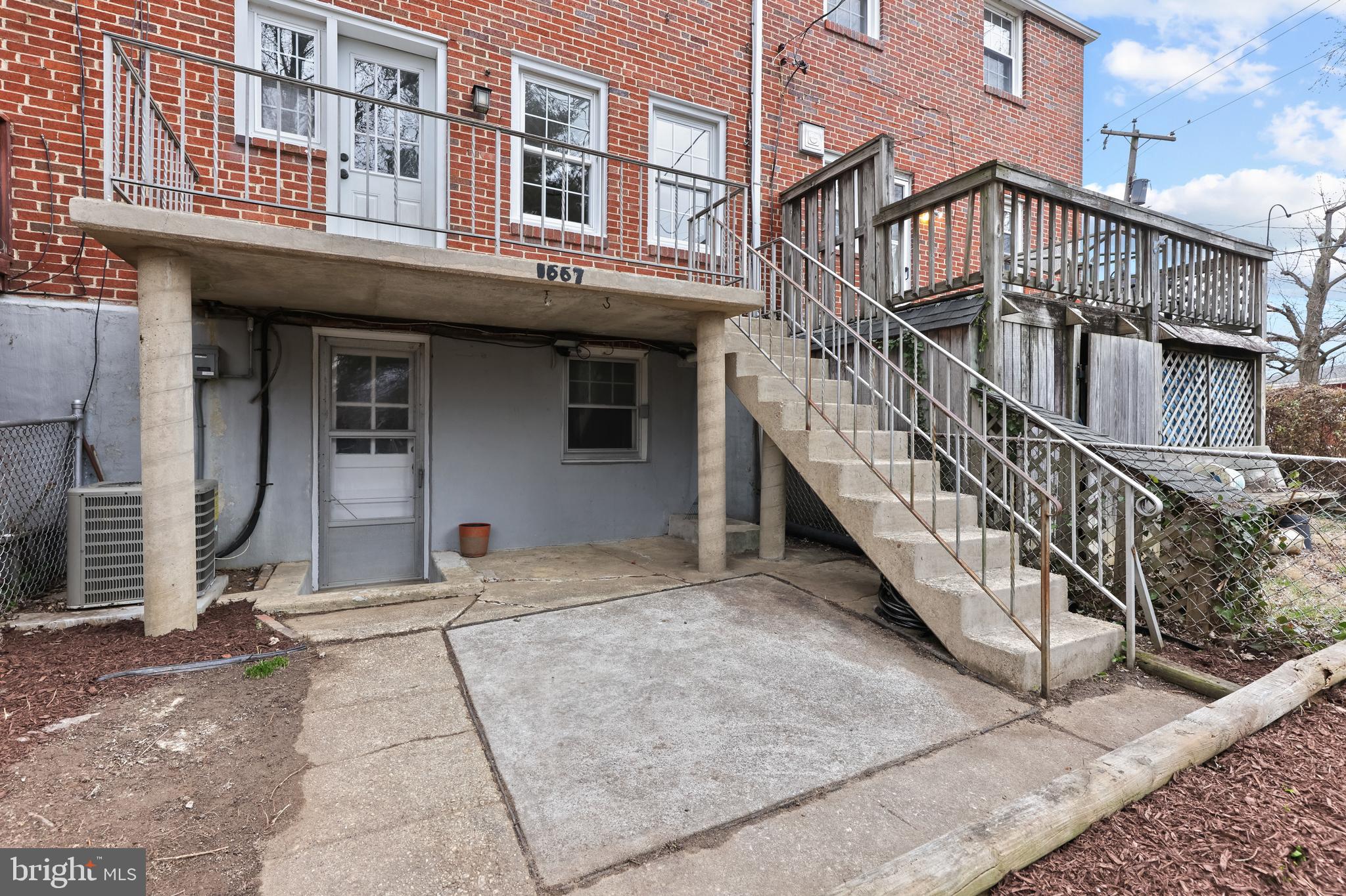 1667 Hardwick Road Towson, MD 21286 - Photo 32 of 34 a view of a building with large windows