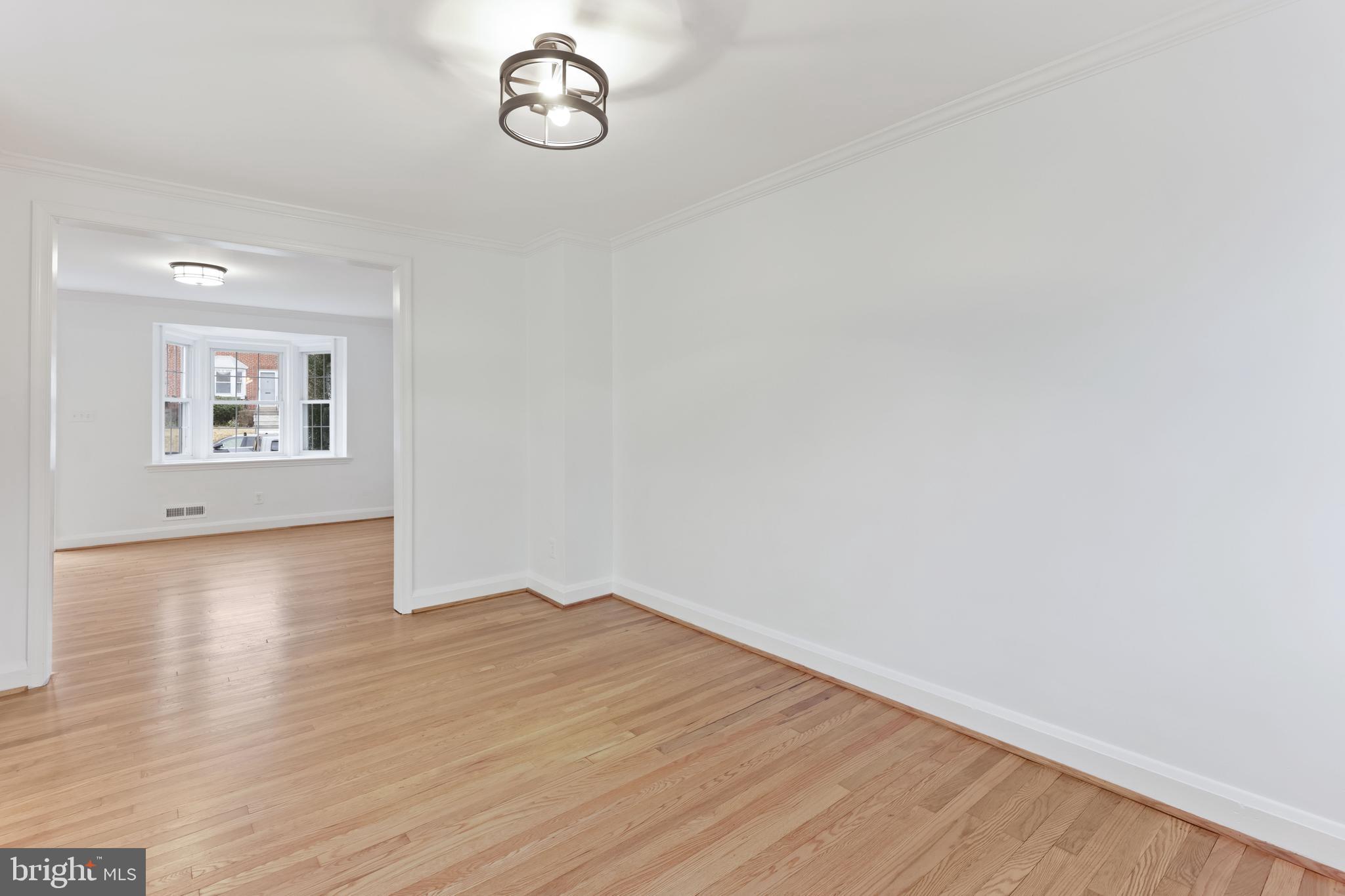 1667 Hardwick Road Towson, MD 21286 - Photo 6 of 34 a view of a room with wooden floor and window