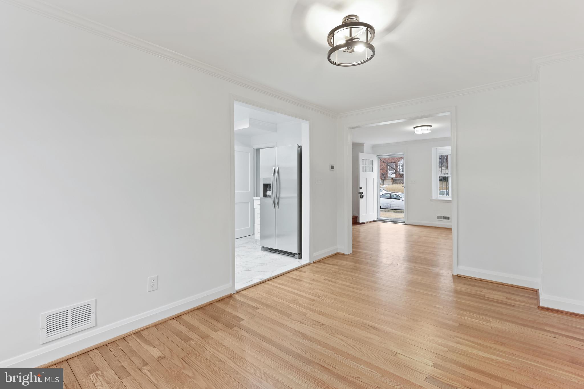 1667 Hardwick Road Towson, MD 21286 - Photo 8 of 34 a view of a room with wooden floor and windows