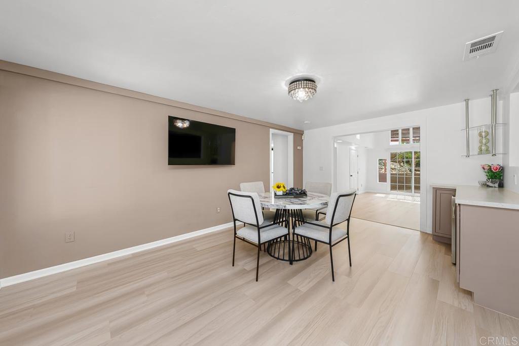 1661 Grove Road El Cajon, CA 92020 - Photo 12 of 44 a view of a livingroom with furniture and a flat screen tv