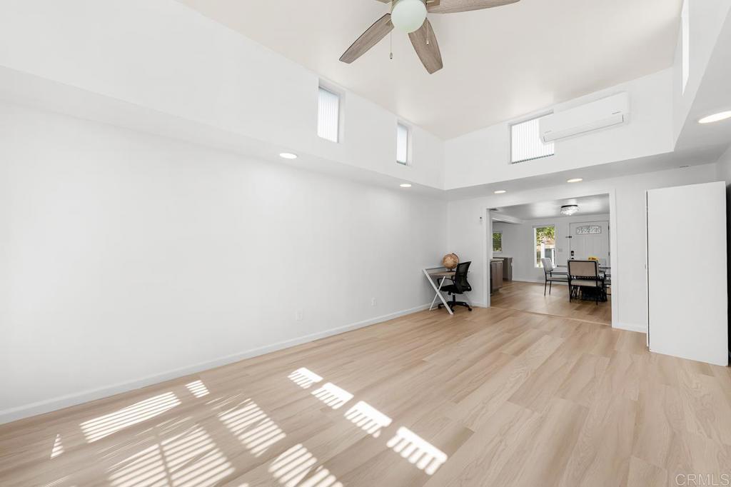 1661 Grove Road El Cajon, CA 92020 - Photo 13 of 44 a view of a room with gym equipment and a window