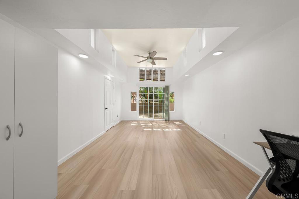 1661 Grove Road El Cajon, CA 92020 - Photo 14 of 44 wooden floor in an empty room with a window