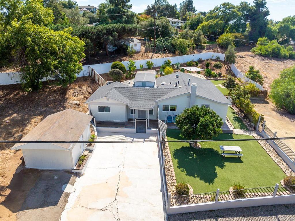 1661 Grove Road El Cajon, CA 92020 - Photo 27 of 44 a view of house with swimming pool