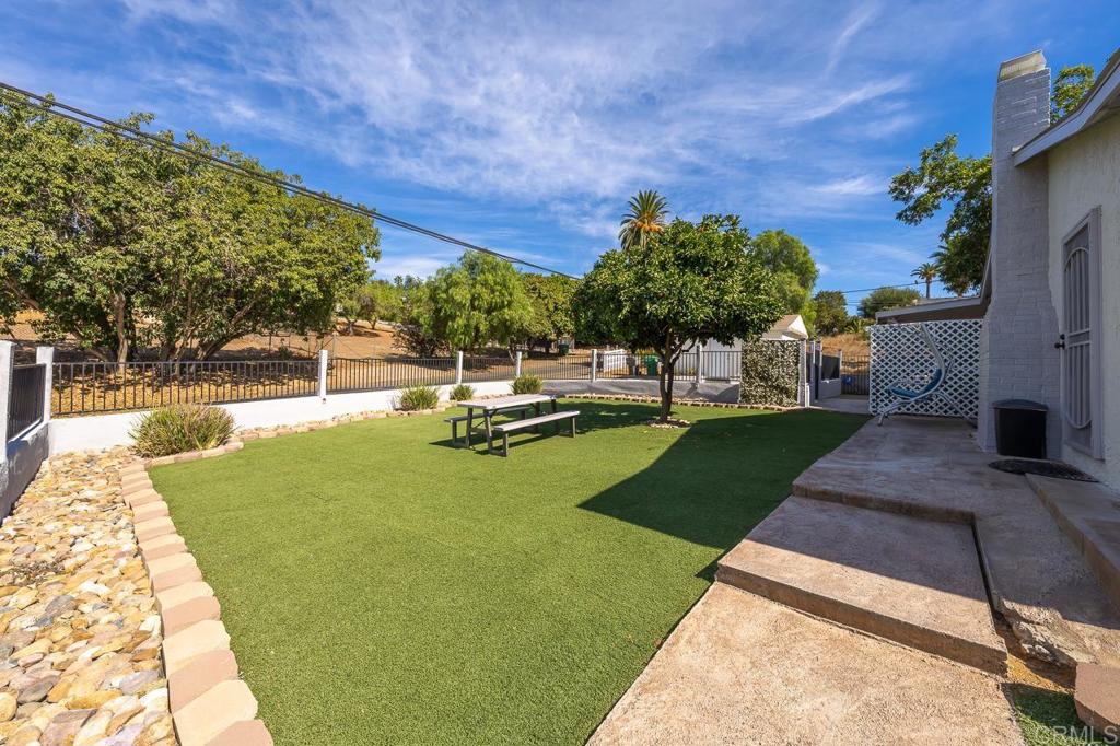 1661 Grove Road El Cajon, CA 92020 - Photo 36 of 44 a view of a backyard with sitting area